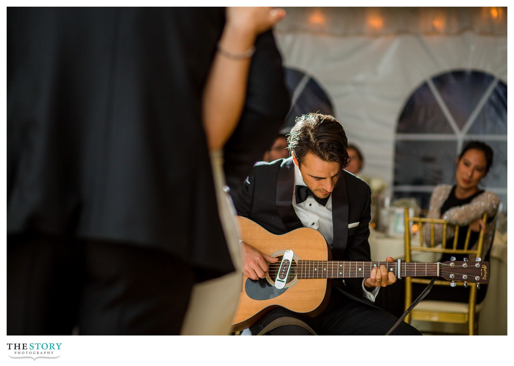 brother of groom plays first dance song at Onondaga Country Club