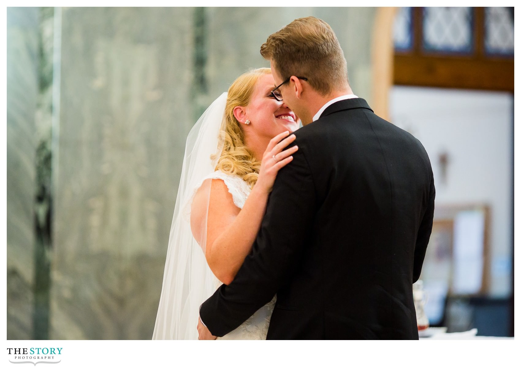 bride and groom's first kiss