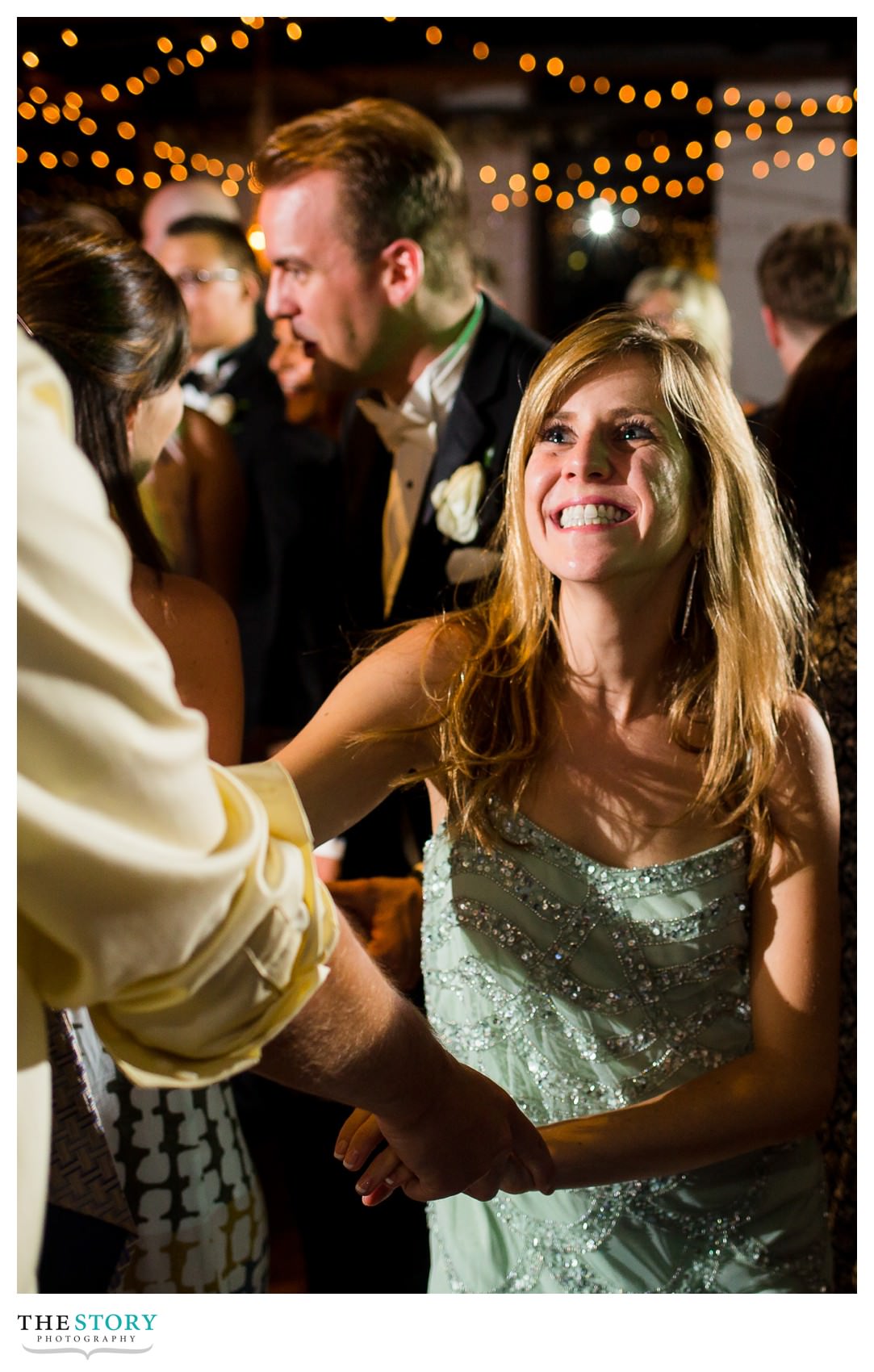 wedding guests enjoy part at Sky Armory Syracuse