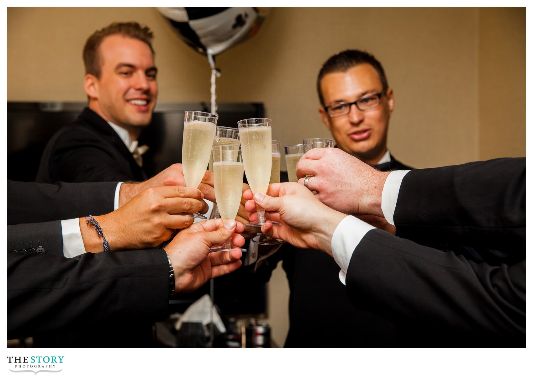 groomsmen toast before Syracuse wedding