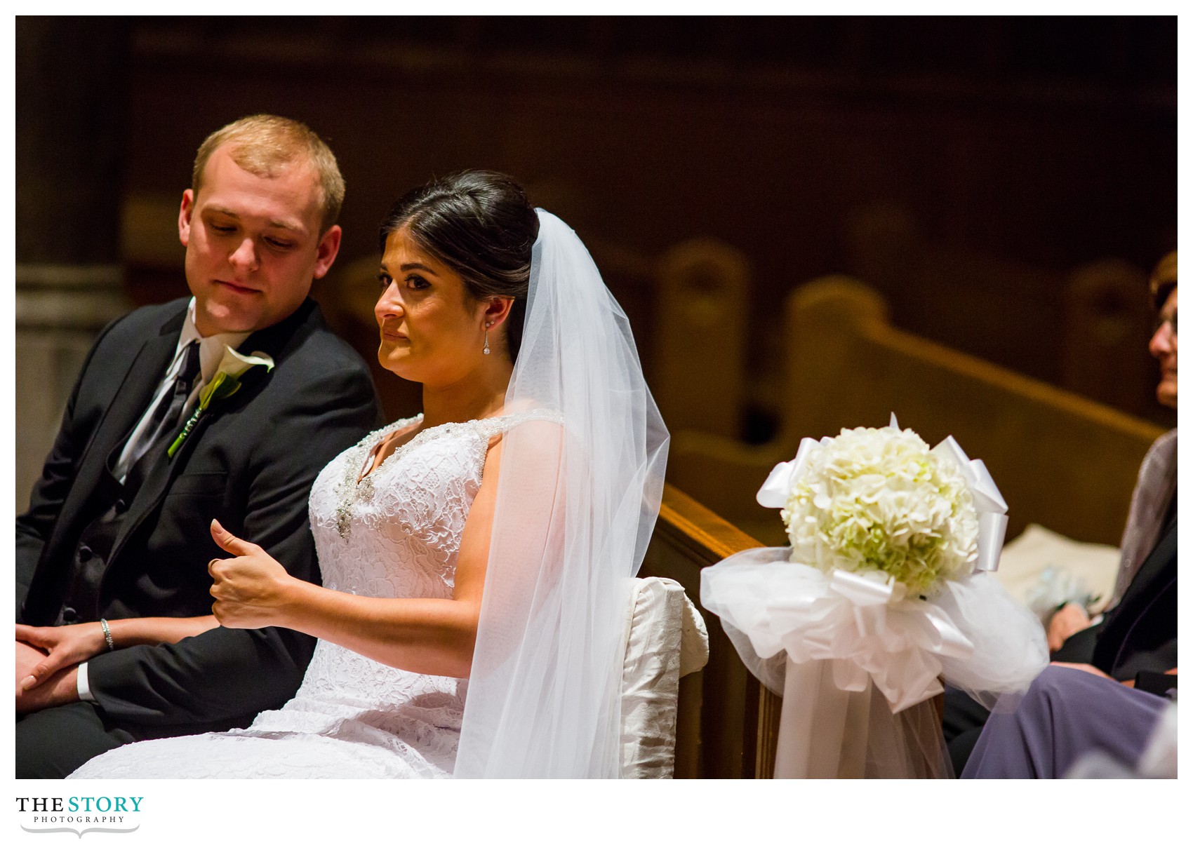 candid moment at cathedral wedding in Syracuse