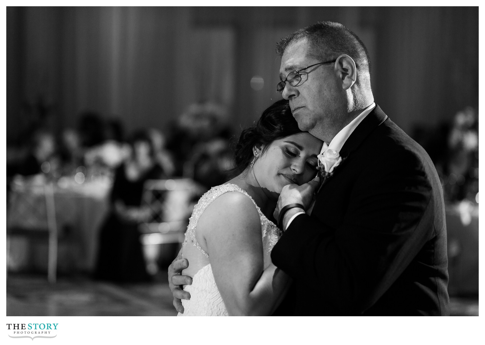 bride and father dance at wedding reception at oncenter