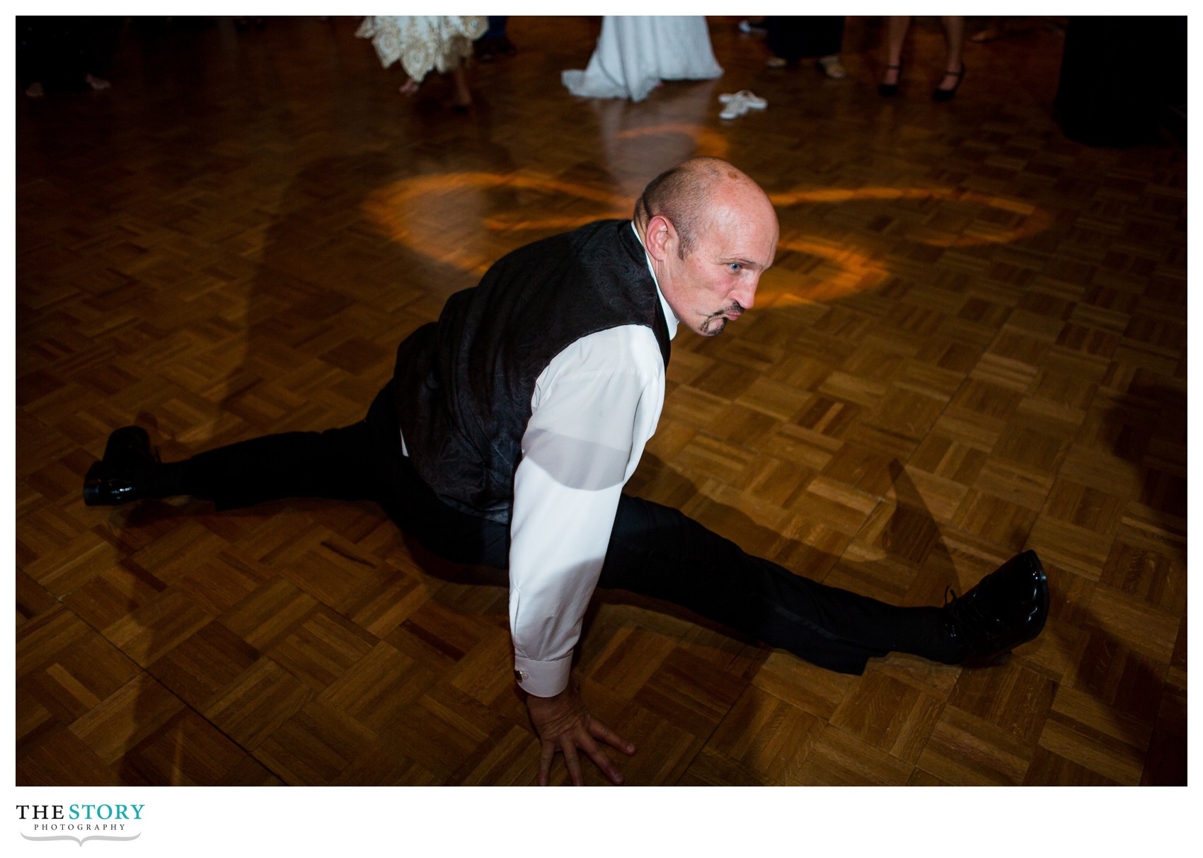 groom's father dancing at oncenter wedding reception