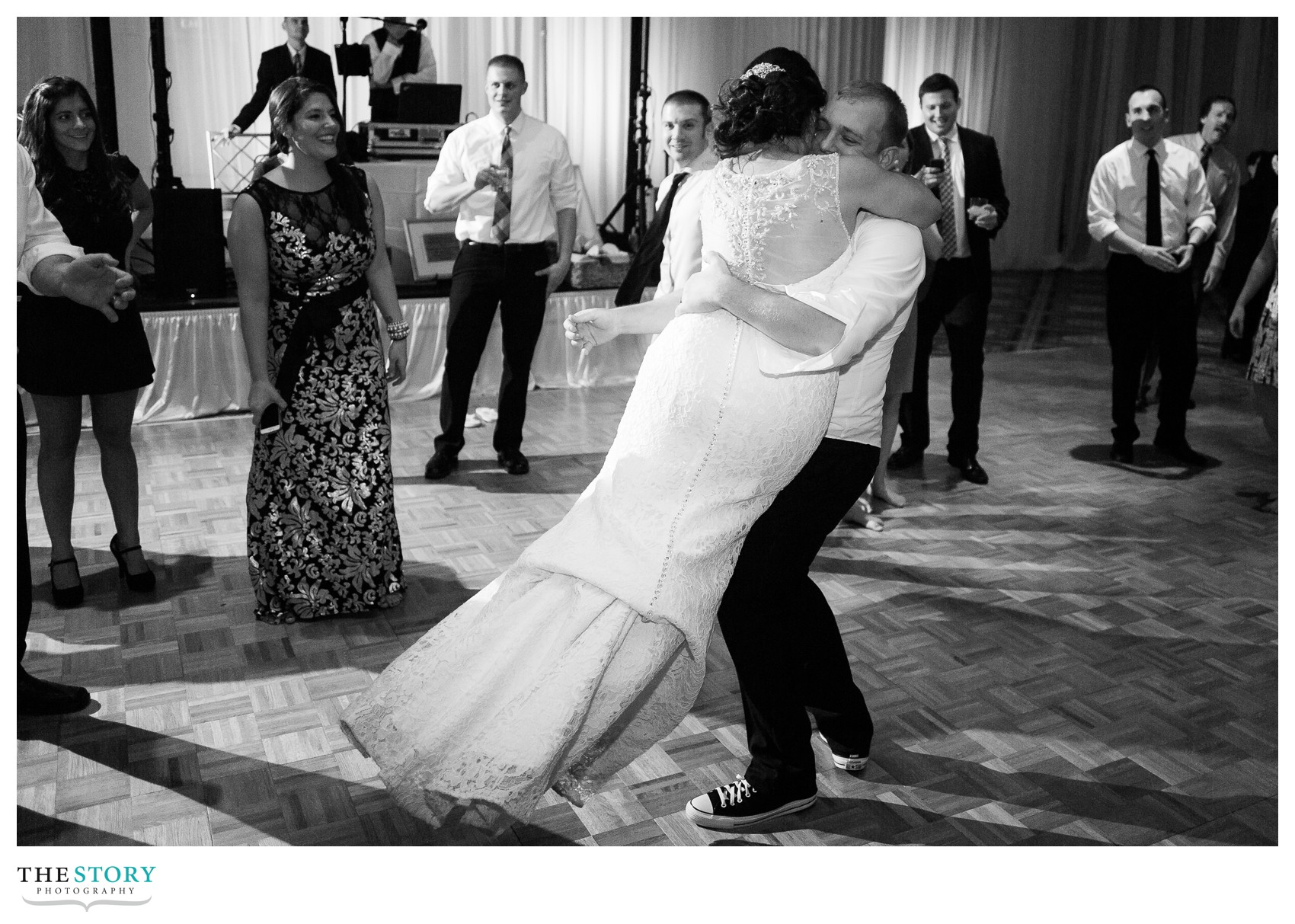 bride and groom dance at oncenter reception