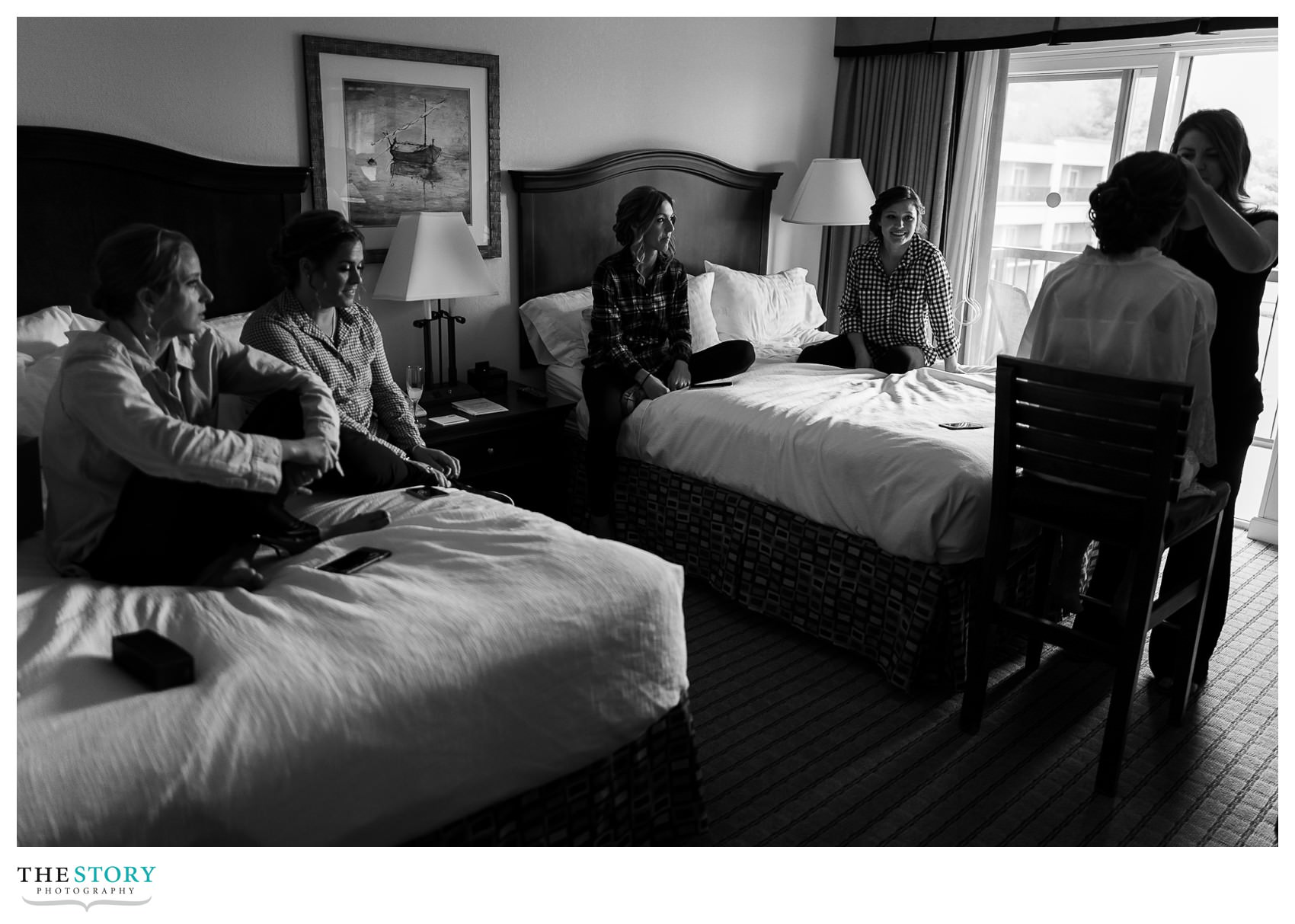 bride and bridesmaids getting ready at Lake George Holiday Inn