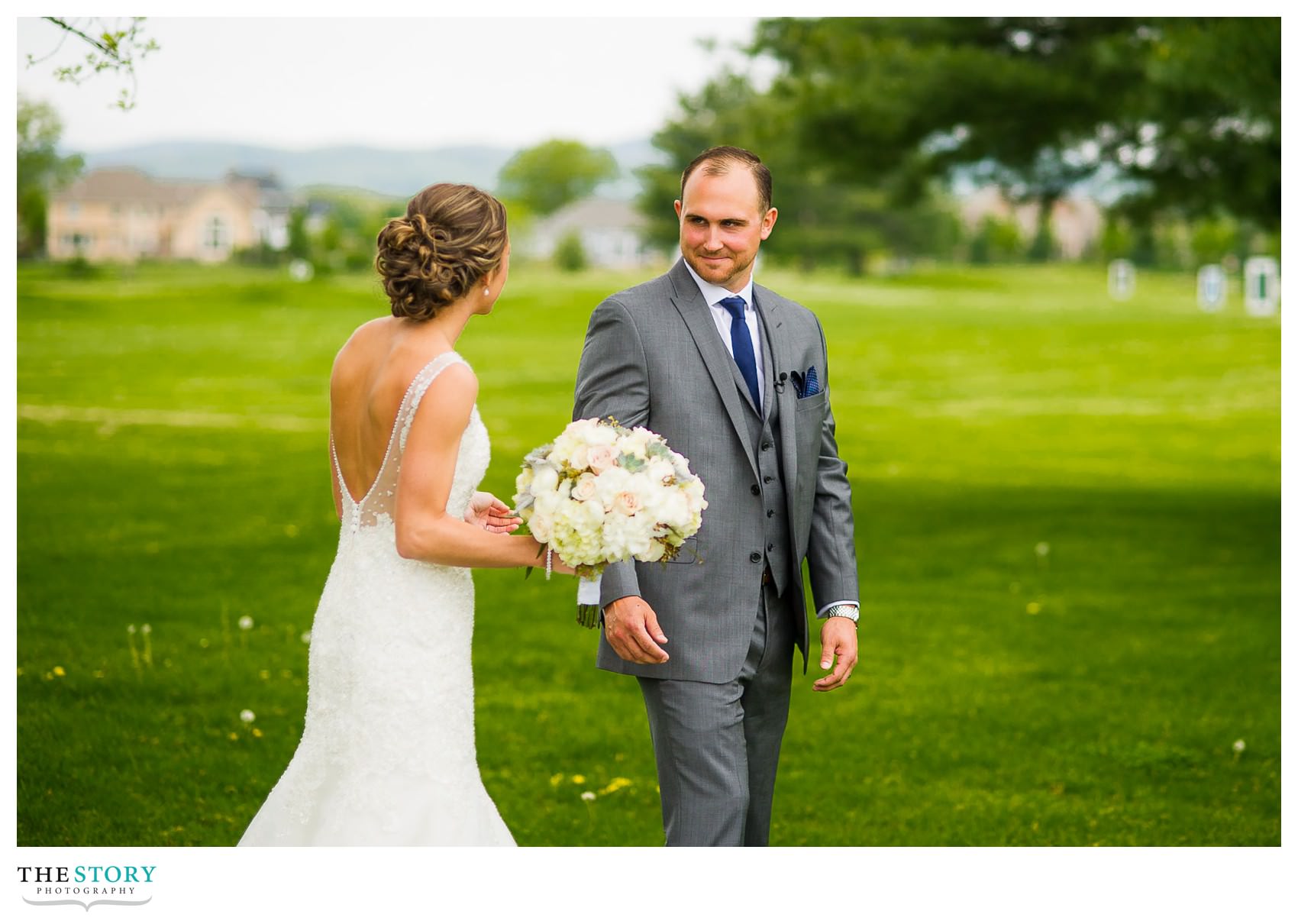 groom seeing bride for the first time on the wedding day at Hiland Park Country Club