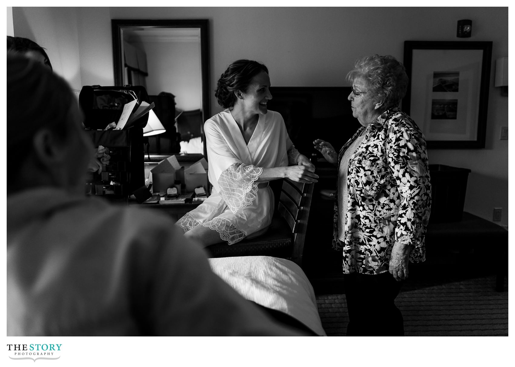 grandmother comes to see bride while getting ready on wedding day
