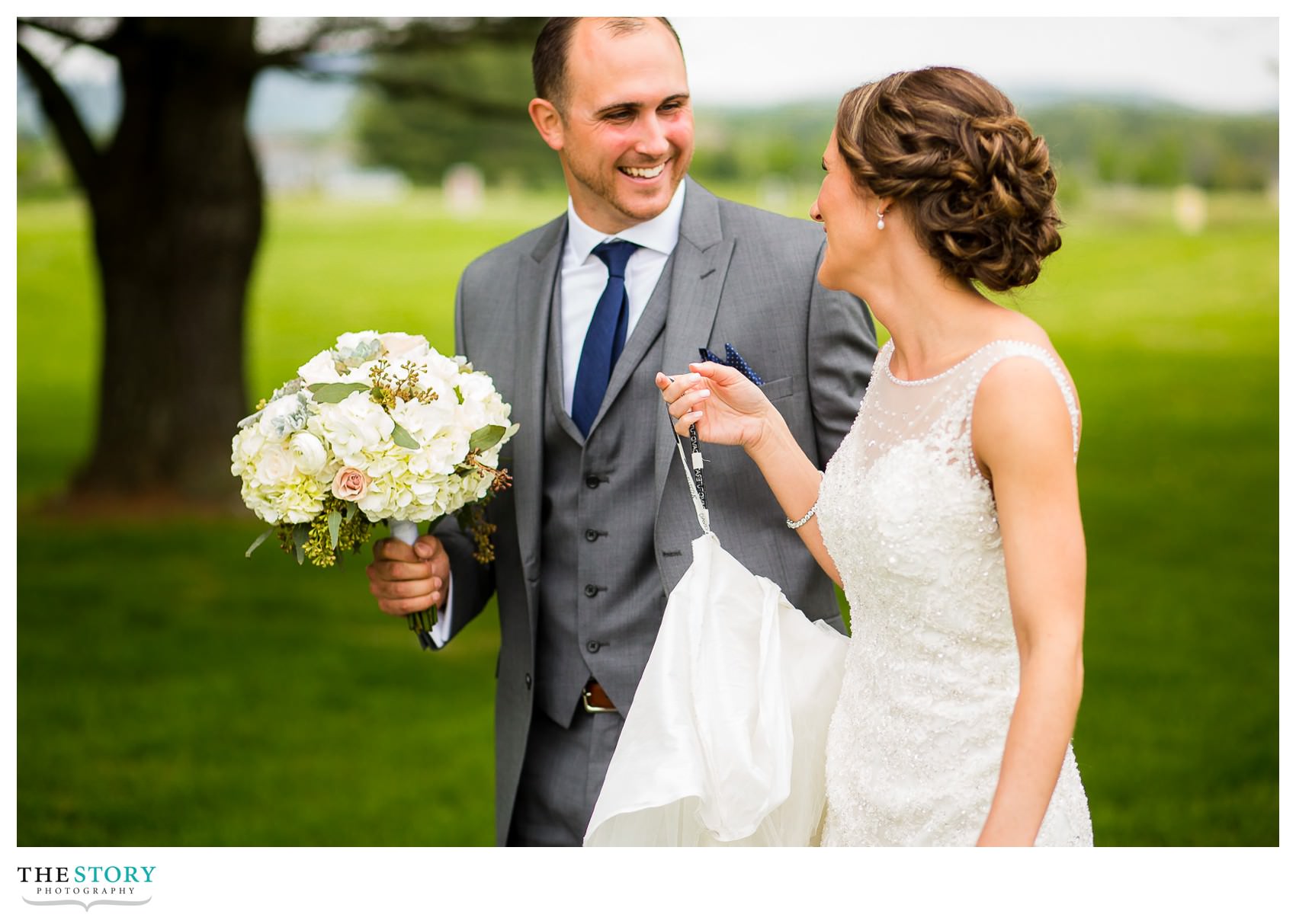 bride and groom walking together at Hiland Park wedding