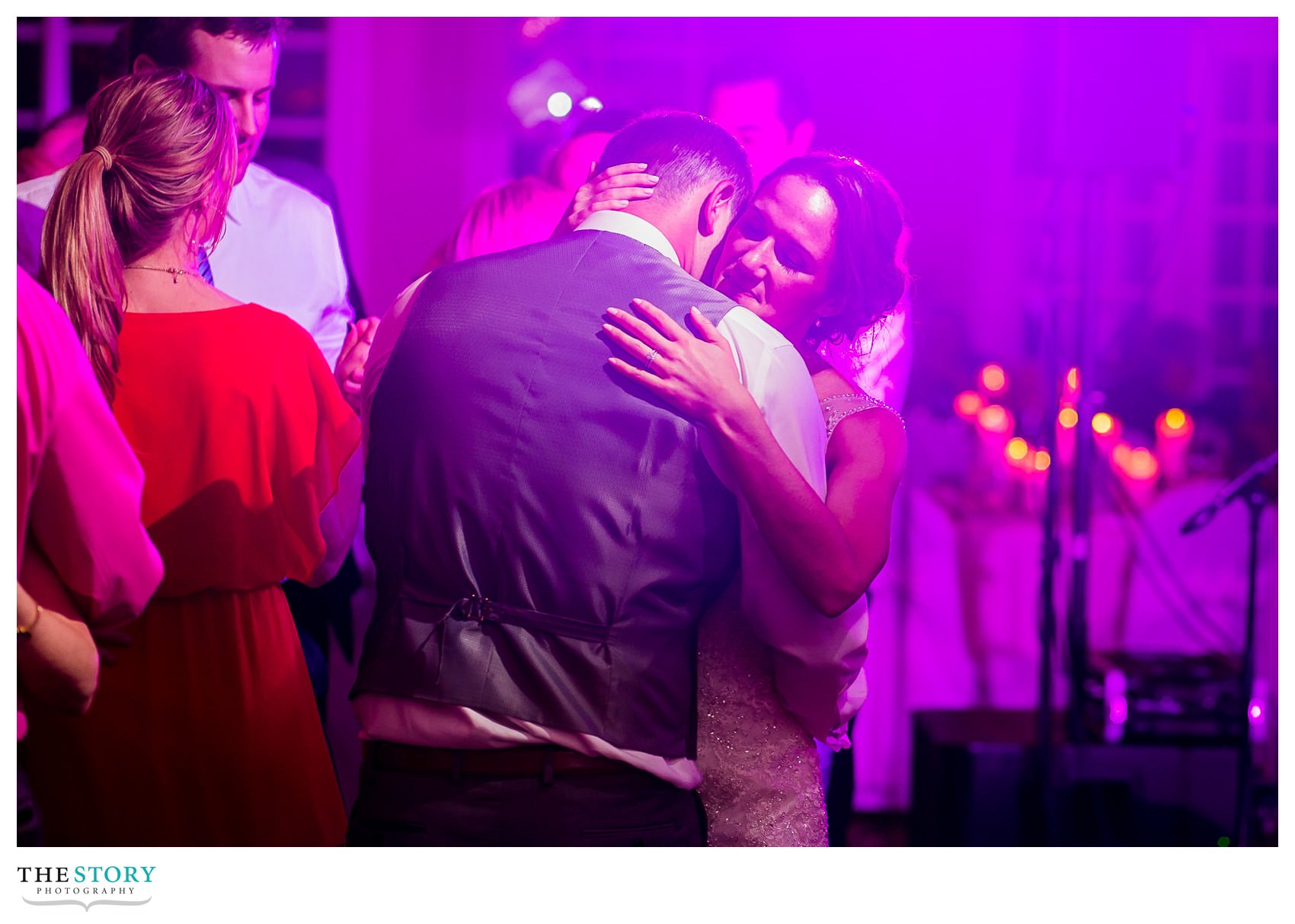 bride and groom enjoy a moment alone dancing at Hiland Park wedding