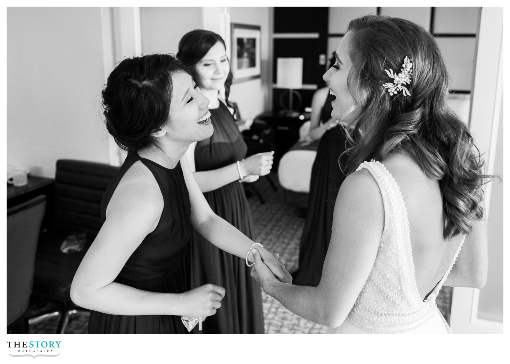 bride with bridesmaid before wedding in Ithaca