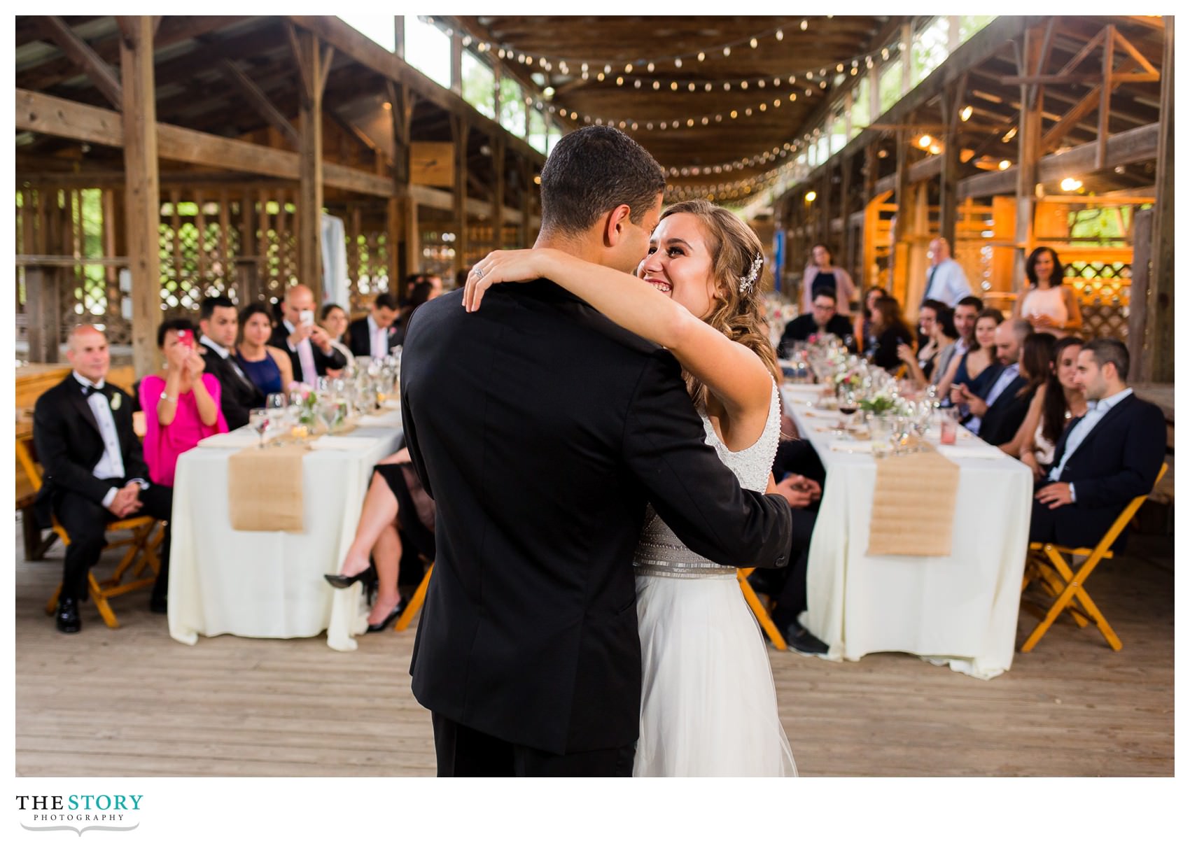 bride and groom's first dance at Ithaca Farmers Market wedding reception