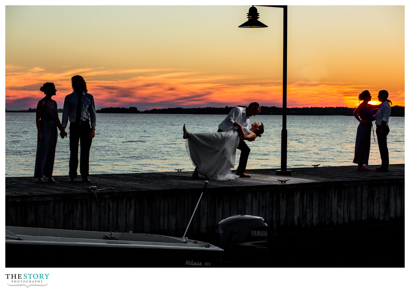 creative wedding photos on river in Clayton, NY