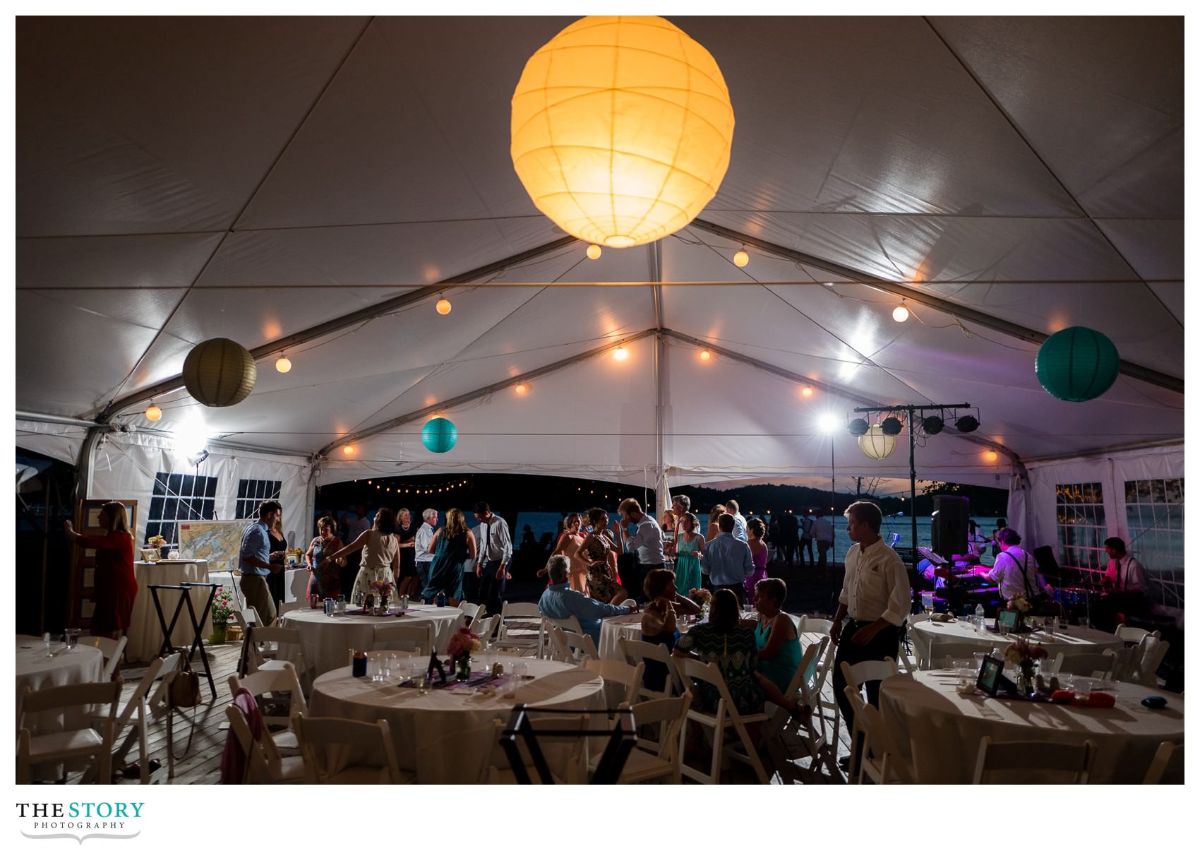 tent wedding reception at antique boat museum in Clayton