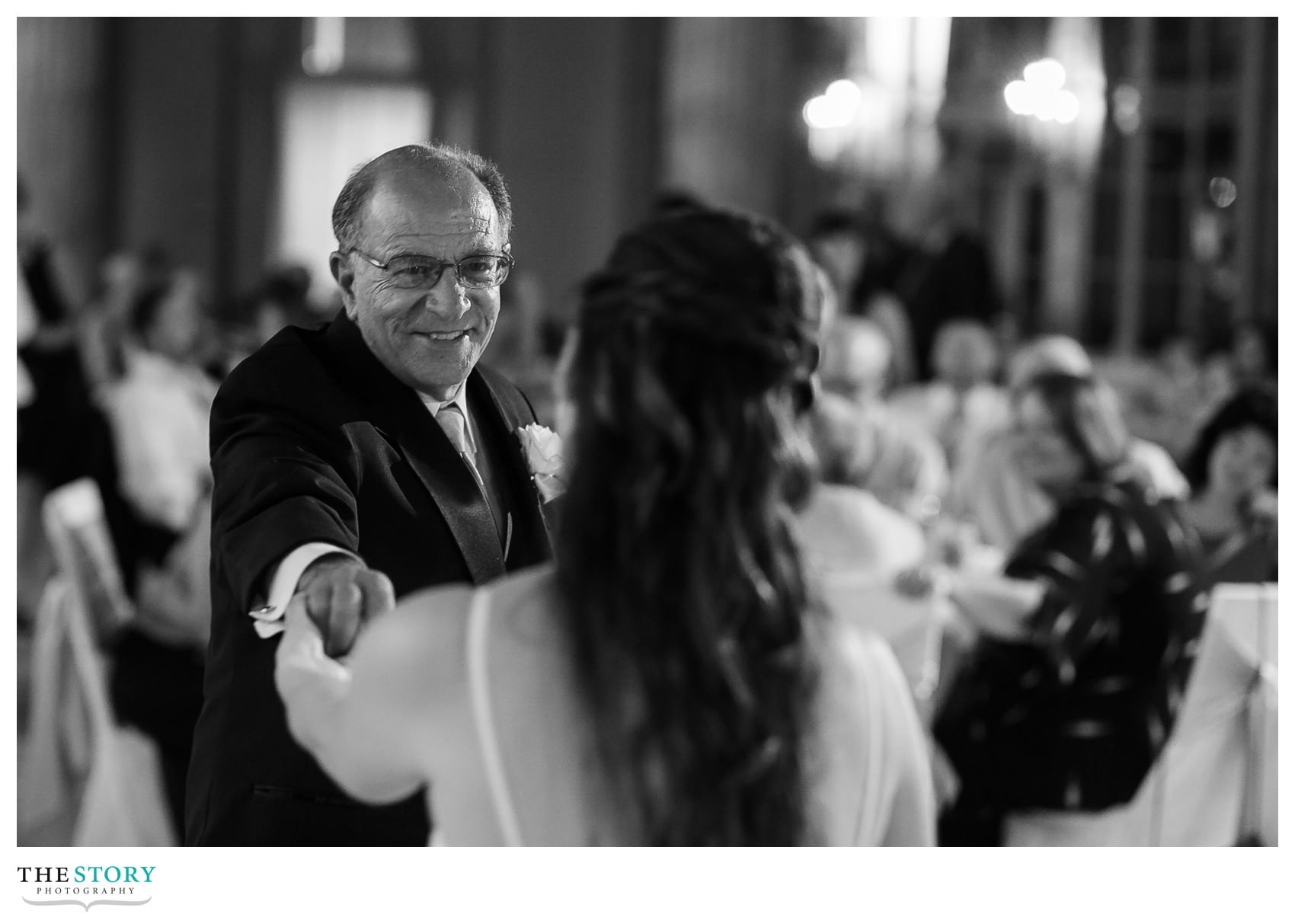 father dances with bride at Hotel Syracuse wedding