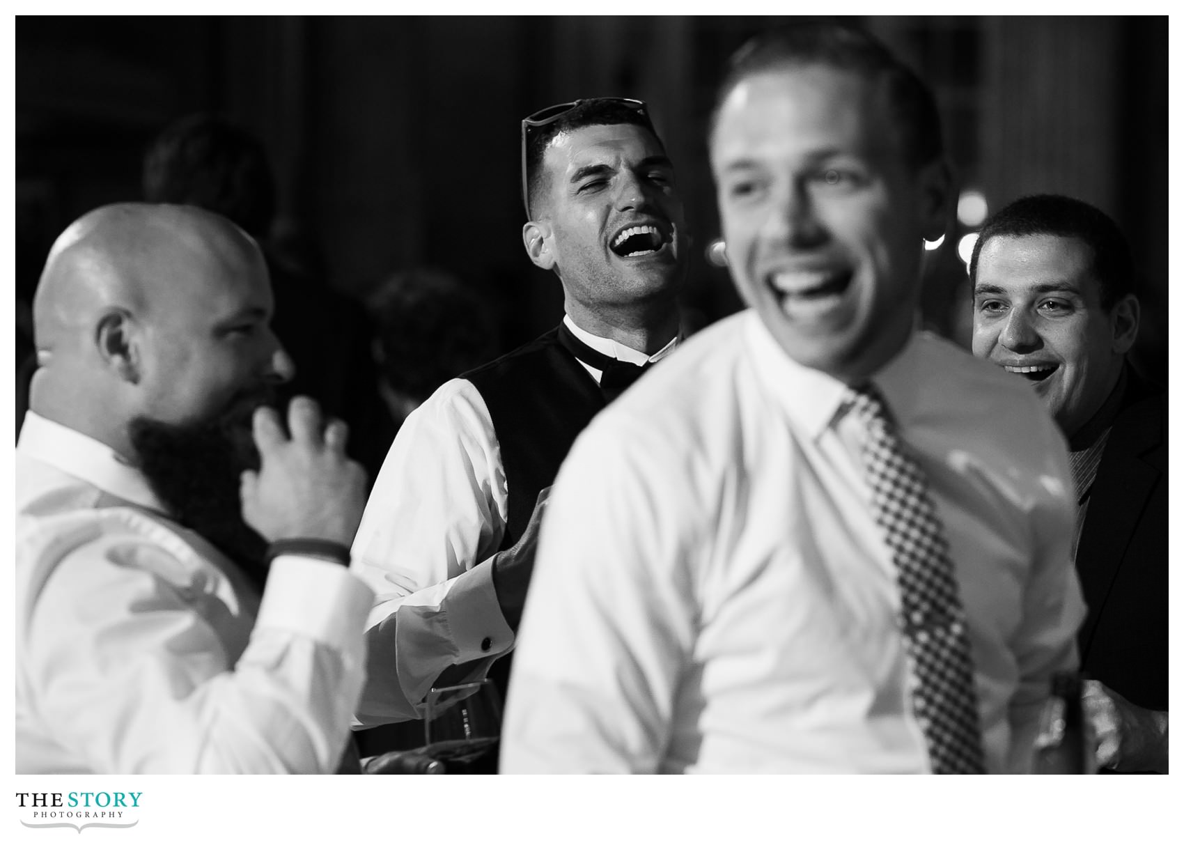 groom having fun at Marriott Syracuse Downtown wedding