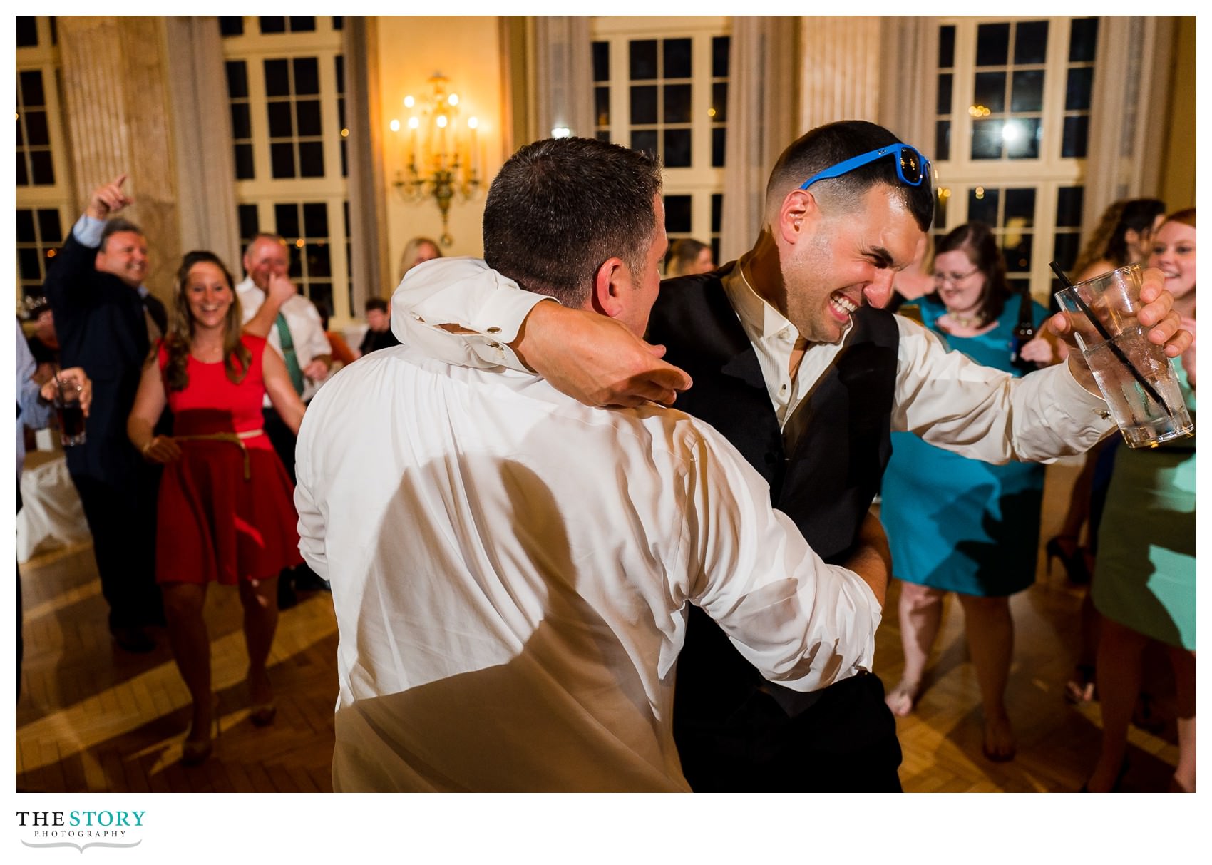 groom enjoying Marriott Syracuse Downtown ballroom wedding