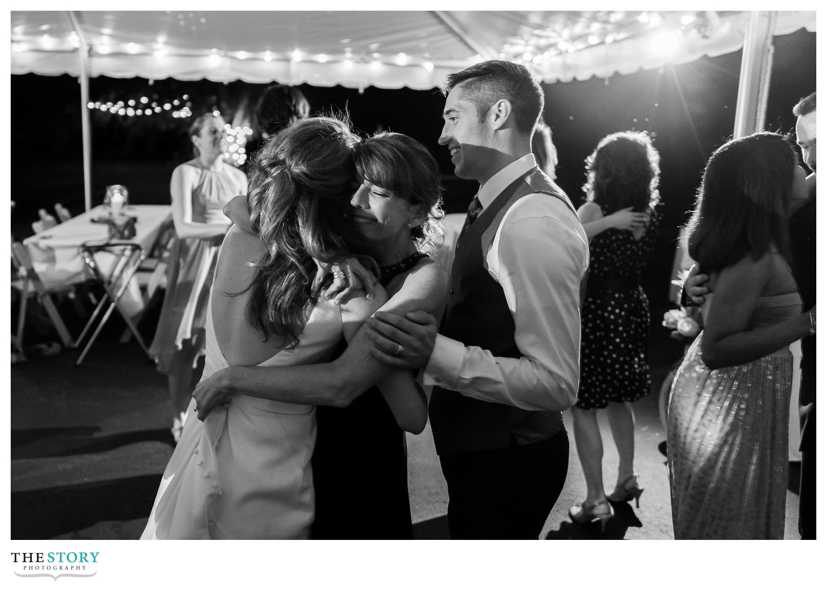 wedding reception under tent on Skaneateles Lake