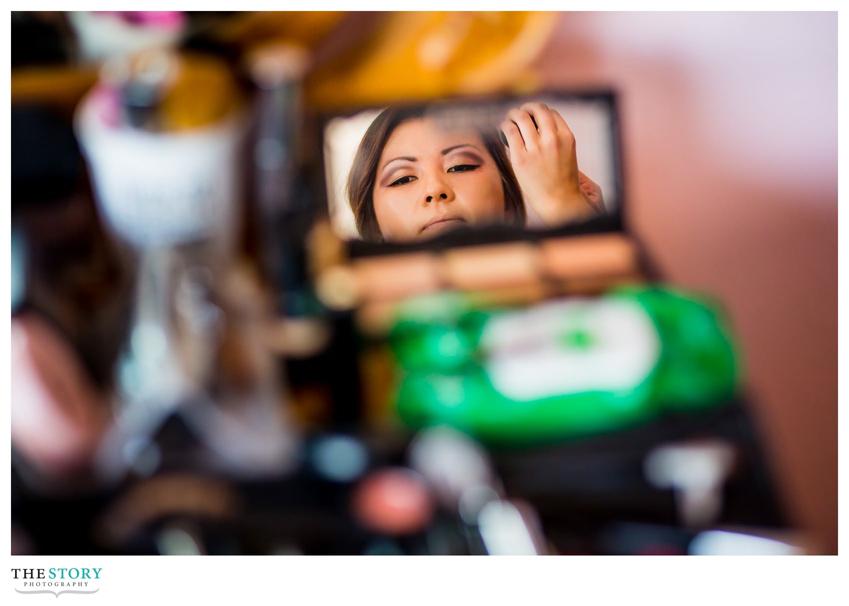 creative wedding photography while bride is getting ready