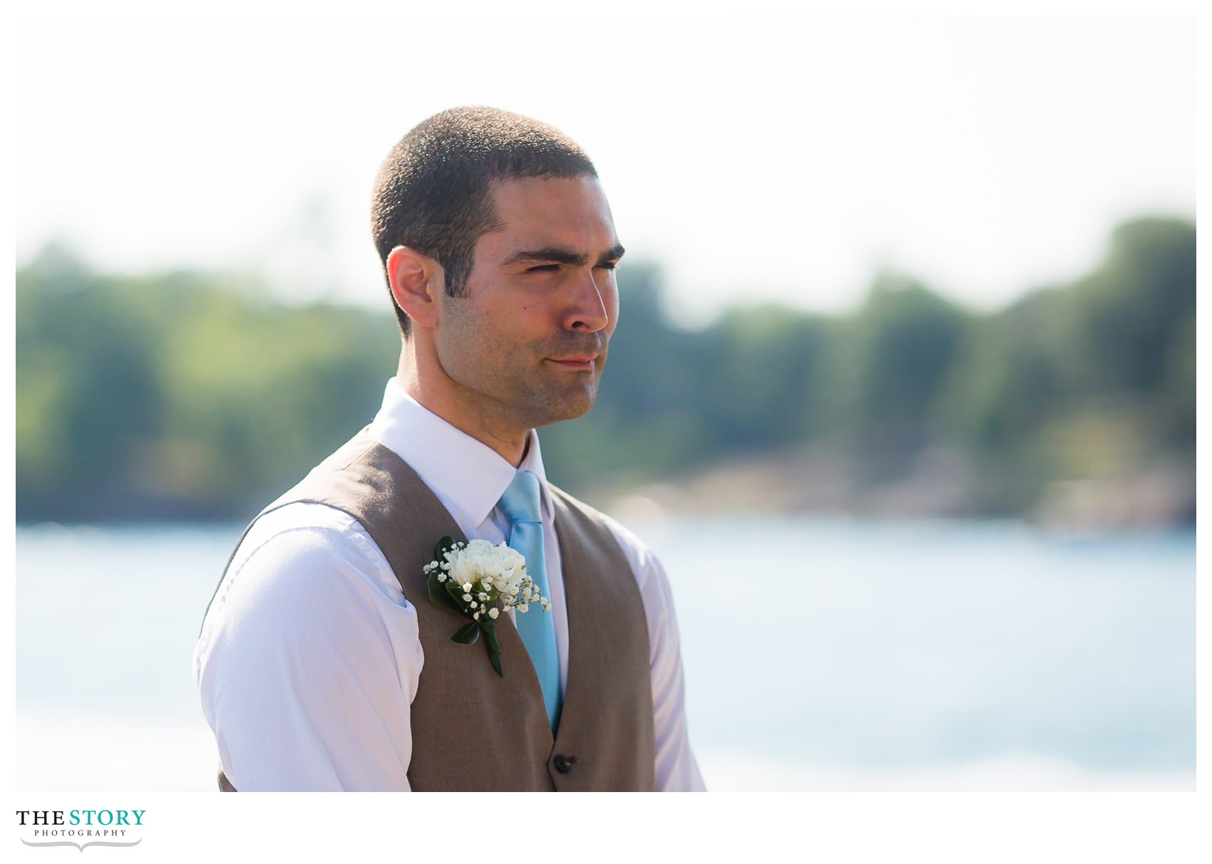 groom watches bride walk down the aisle at casa blanca on Cherry Island