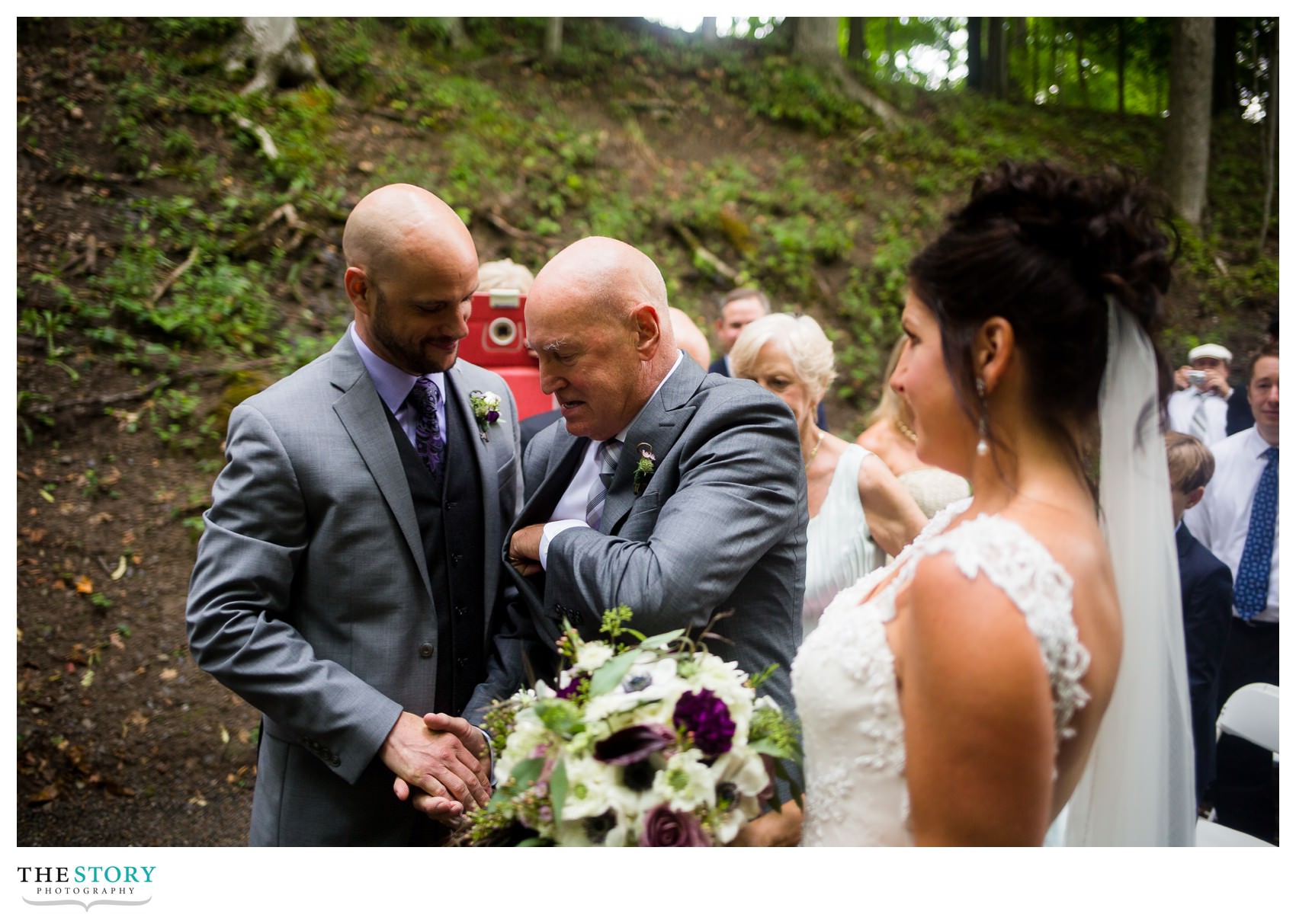 father of bride greeting the groom at Ithaca wedding