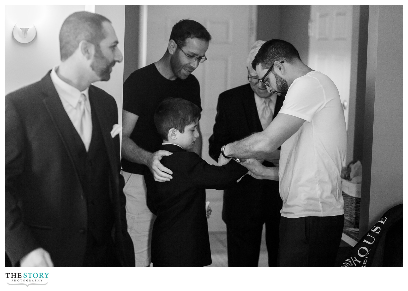 groom getting ready for wedding at Watkins Glen Harbor Hotel