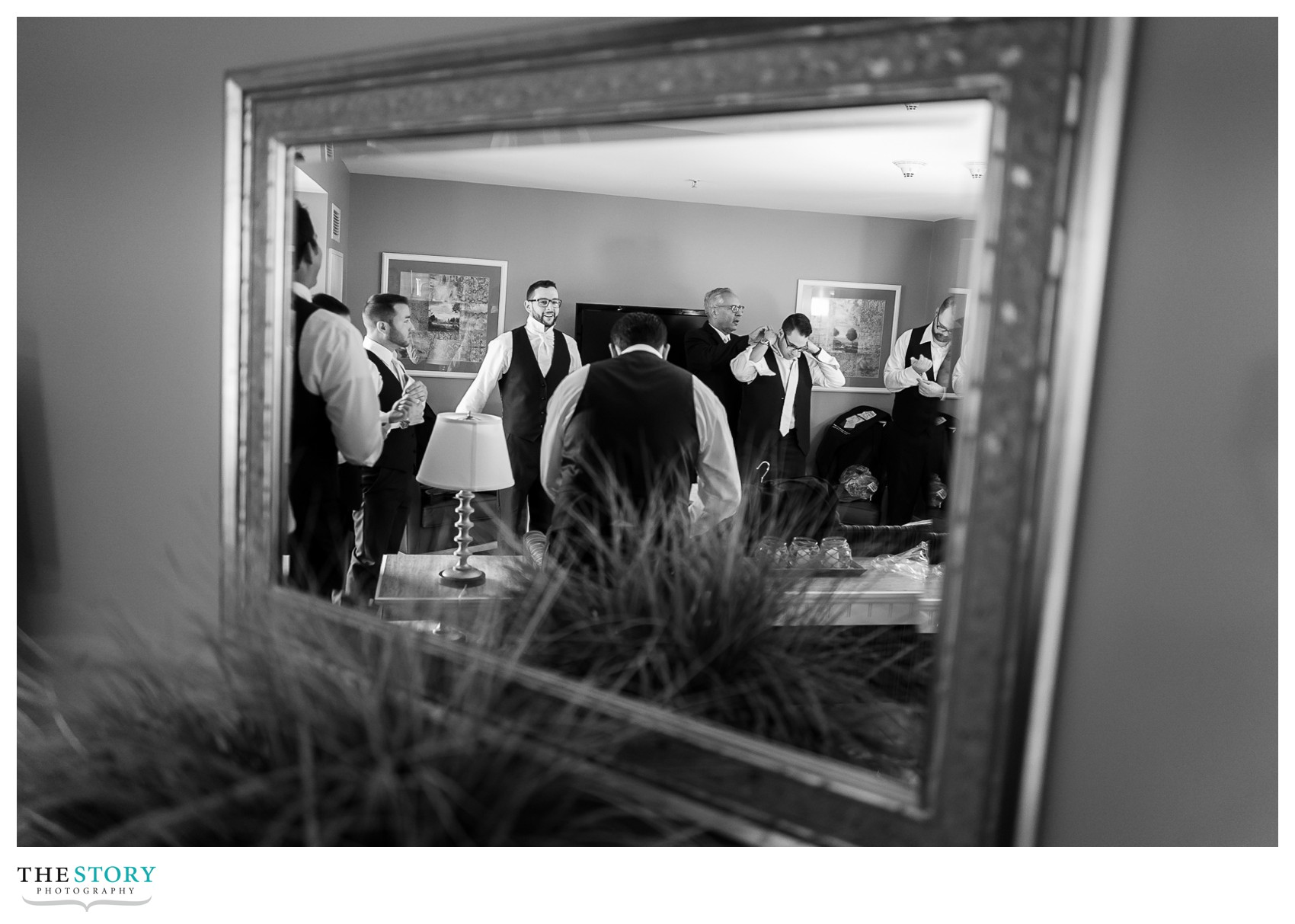 groom at Watkins Glen Harbor Hotel getting ready for wedding day