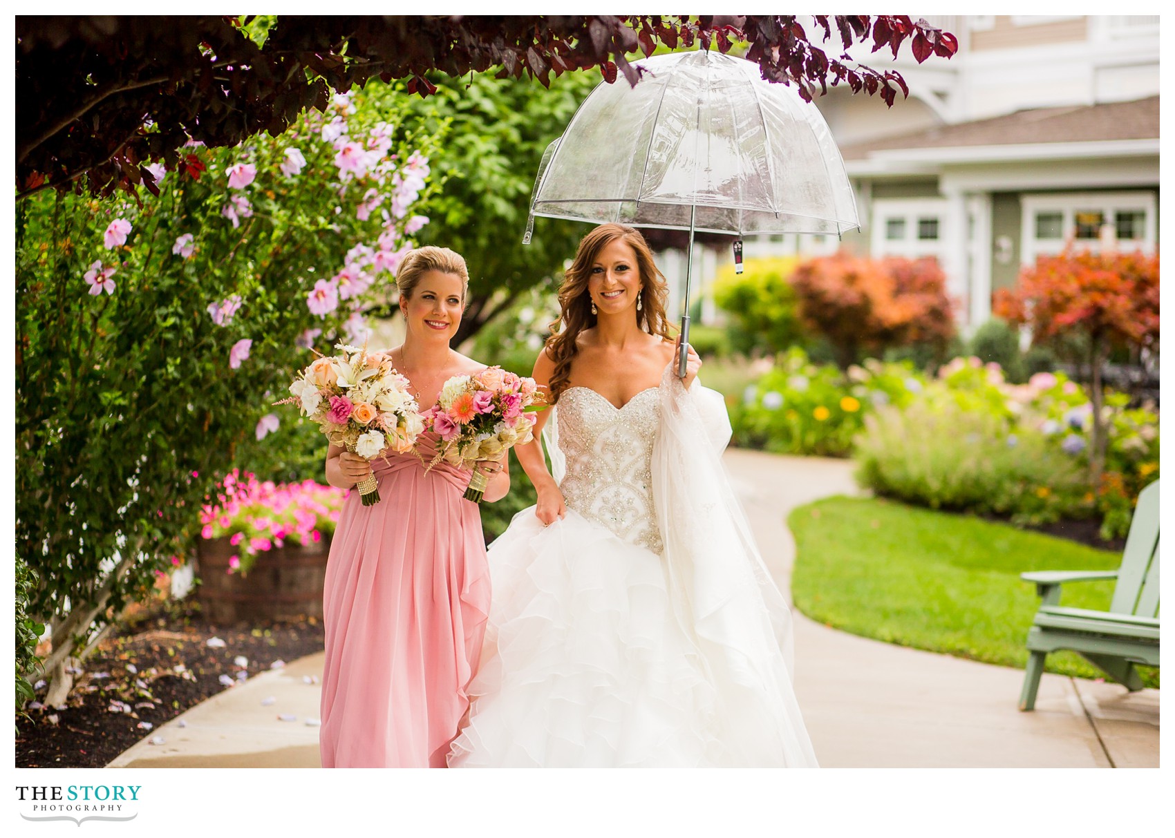 bride and bridesmaid walking to first look on the shore of Seneca Lake
