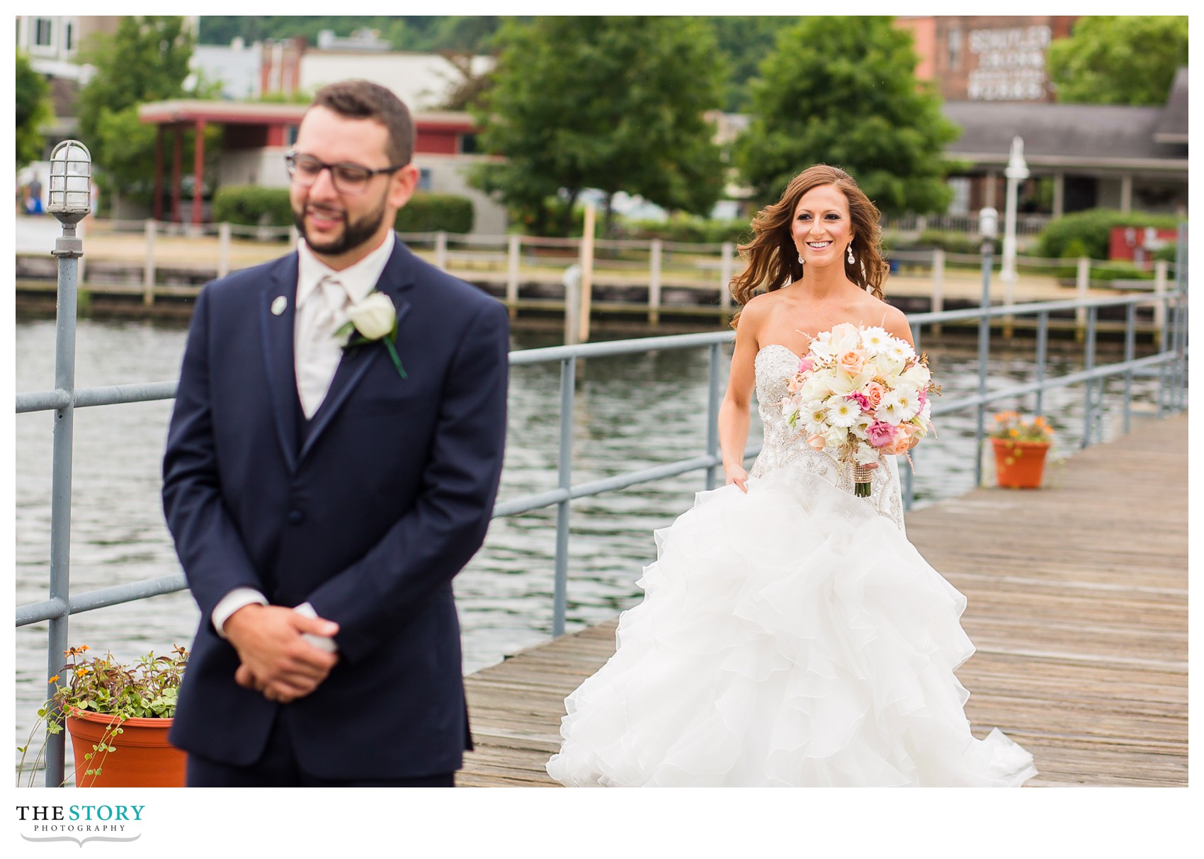 bride walking to see groom for the first time on their wedding day in Watkins Glens