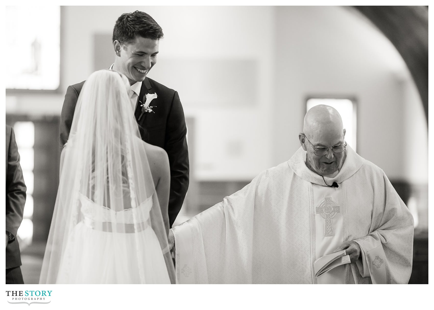 Fun moment during wedding ceremony at Our
 Lady of The Cape