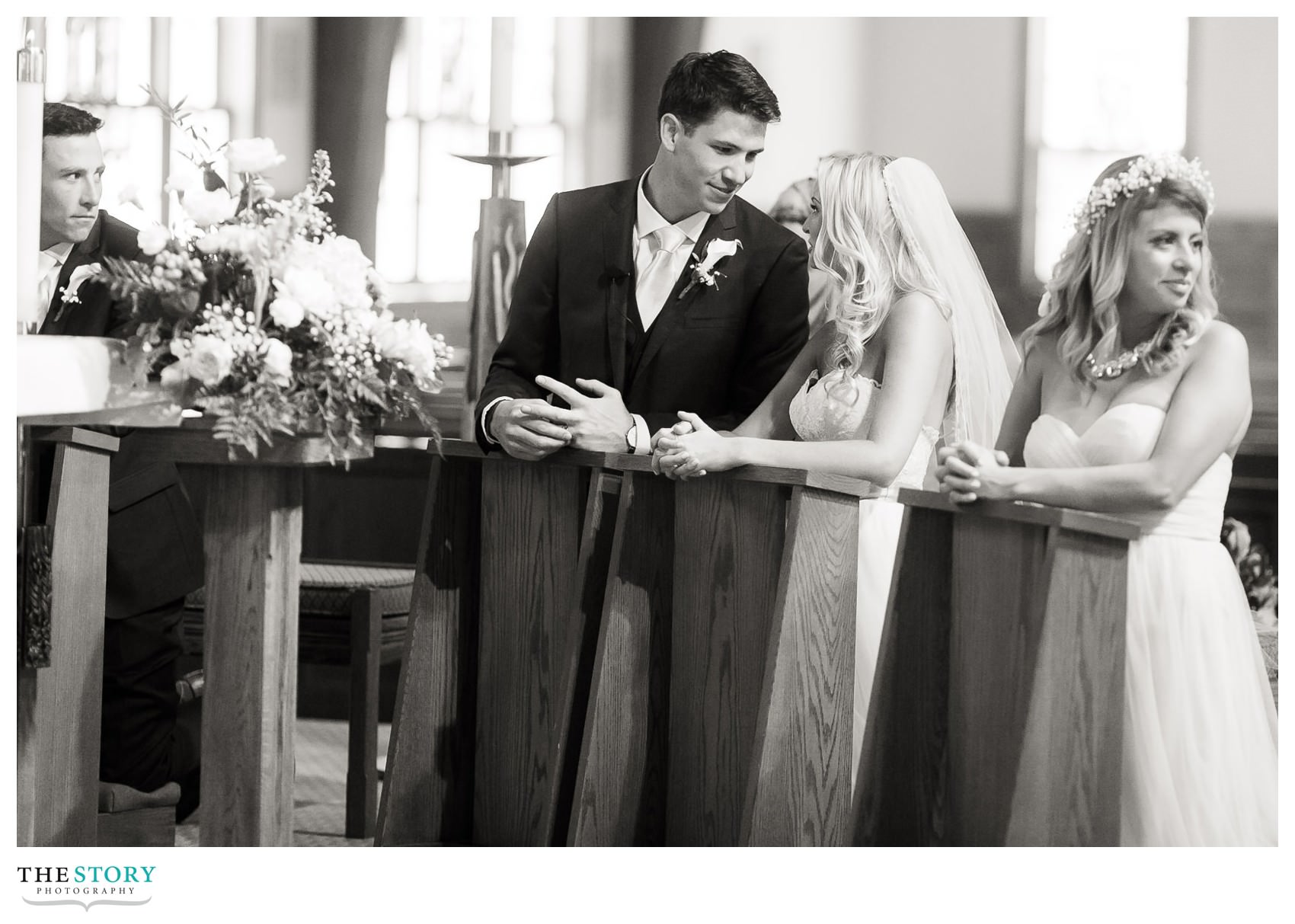 bride and groom enjoy a stolen moment during wedding ceremony