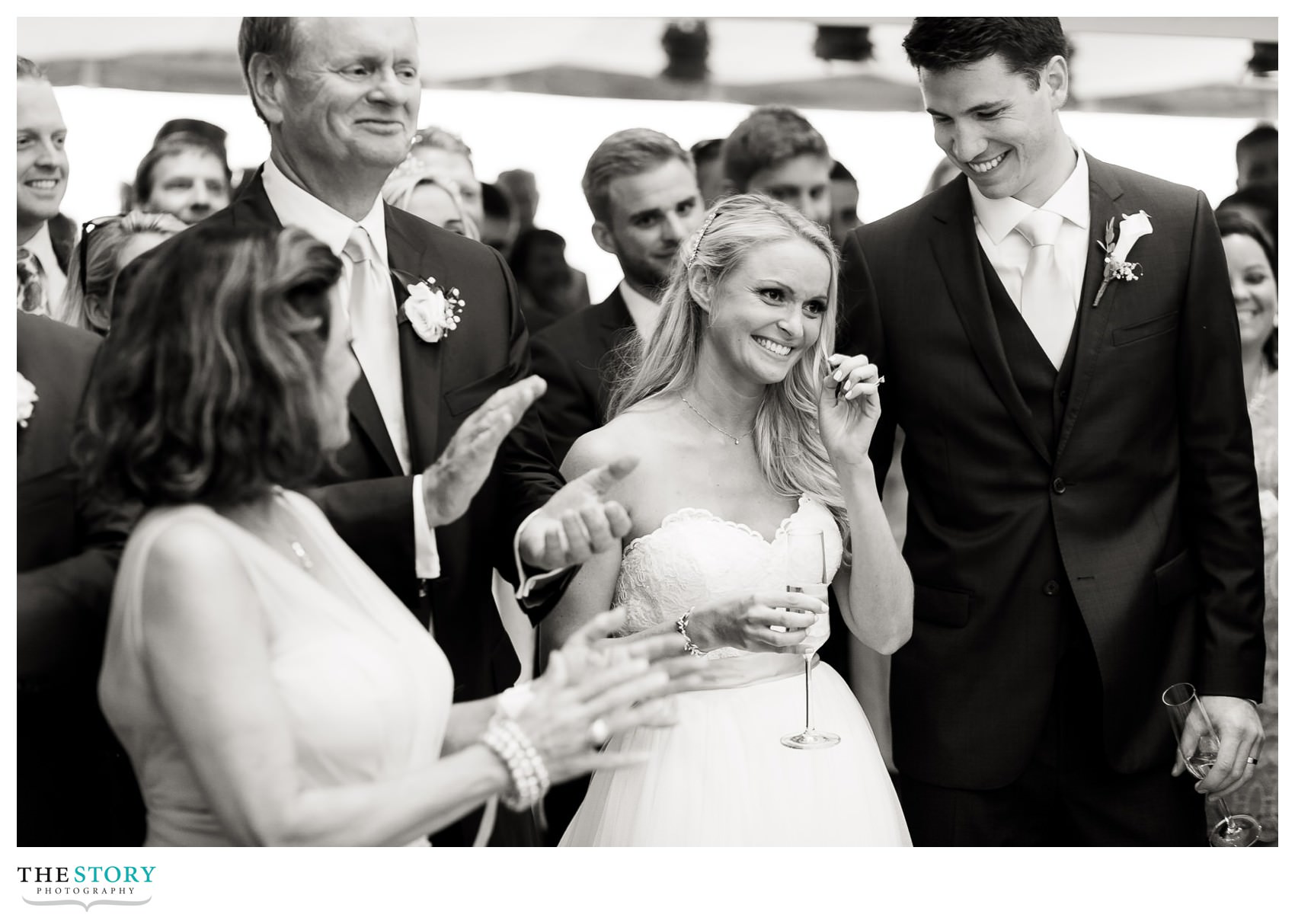 bride enjoys a moment during speech at Chatham Bars Inn wedding reception