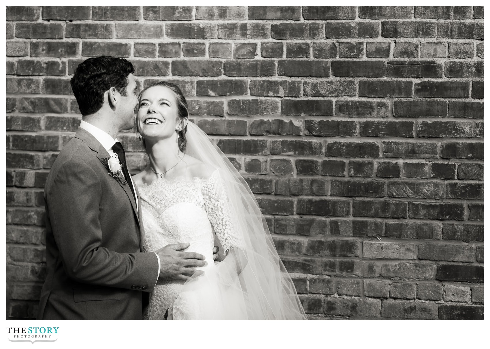 bride and groom laughing on wedding day