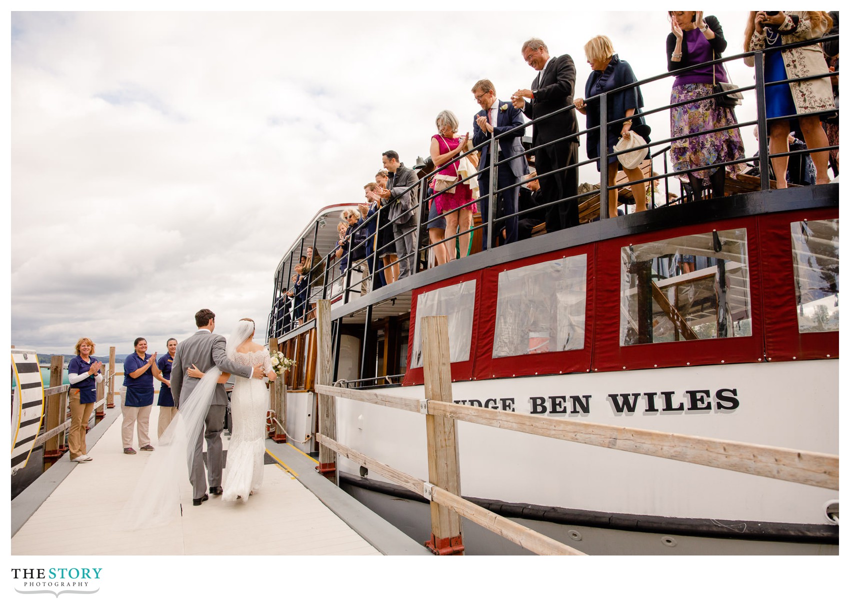 bride and groom boarding the Judge Ben Wiles on Skaneateles Lake