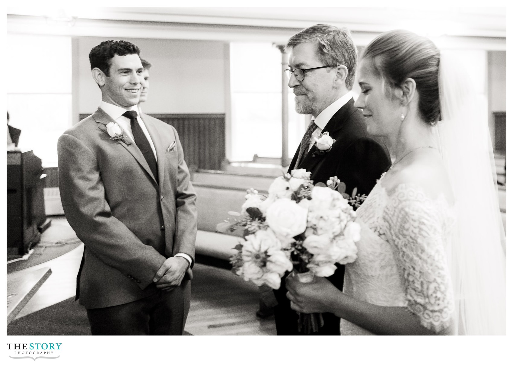 Bride and groom see each other for the first time at the wedding ceremony in Skaneateles, NY