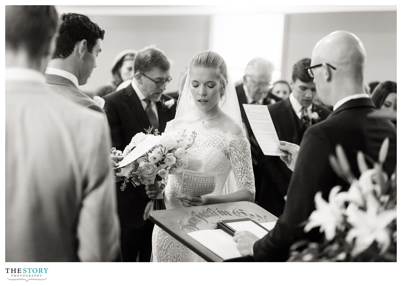 singing during the wedding ceremony at Skaneateles First Baptist Church 