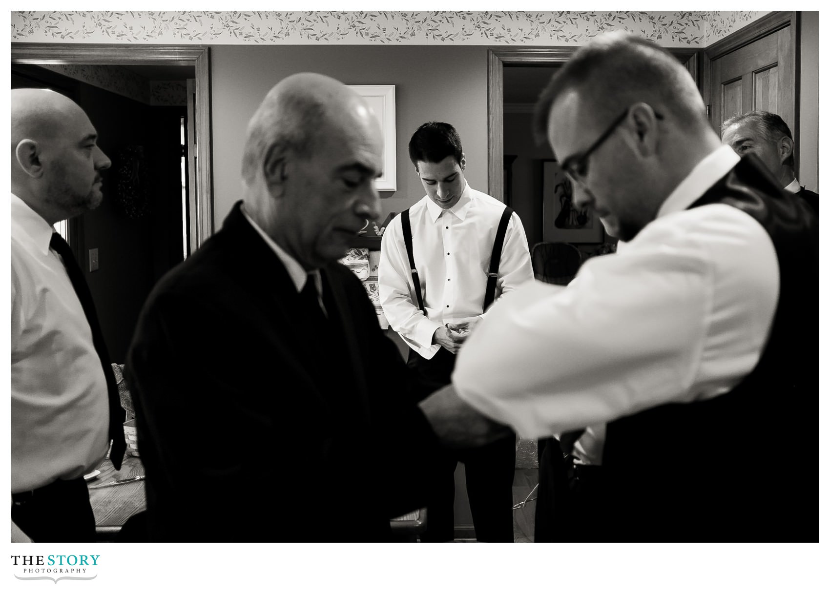 groom getting ready for Syracuse wedding