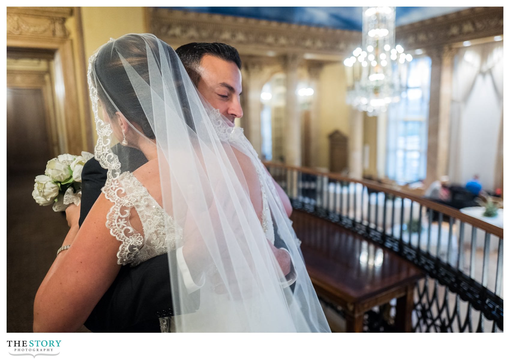 bride and groom enjoy a moment during the first look at Marriott Syracuse Downtown