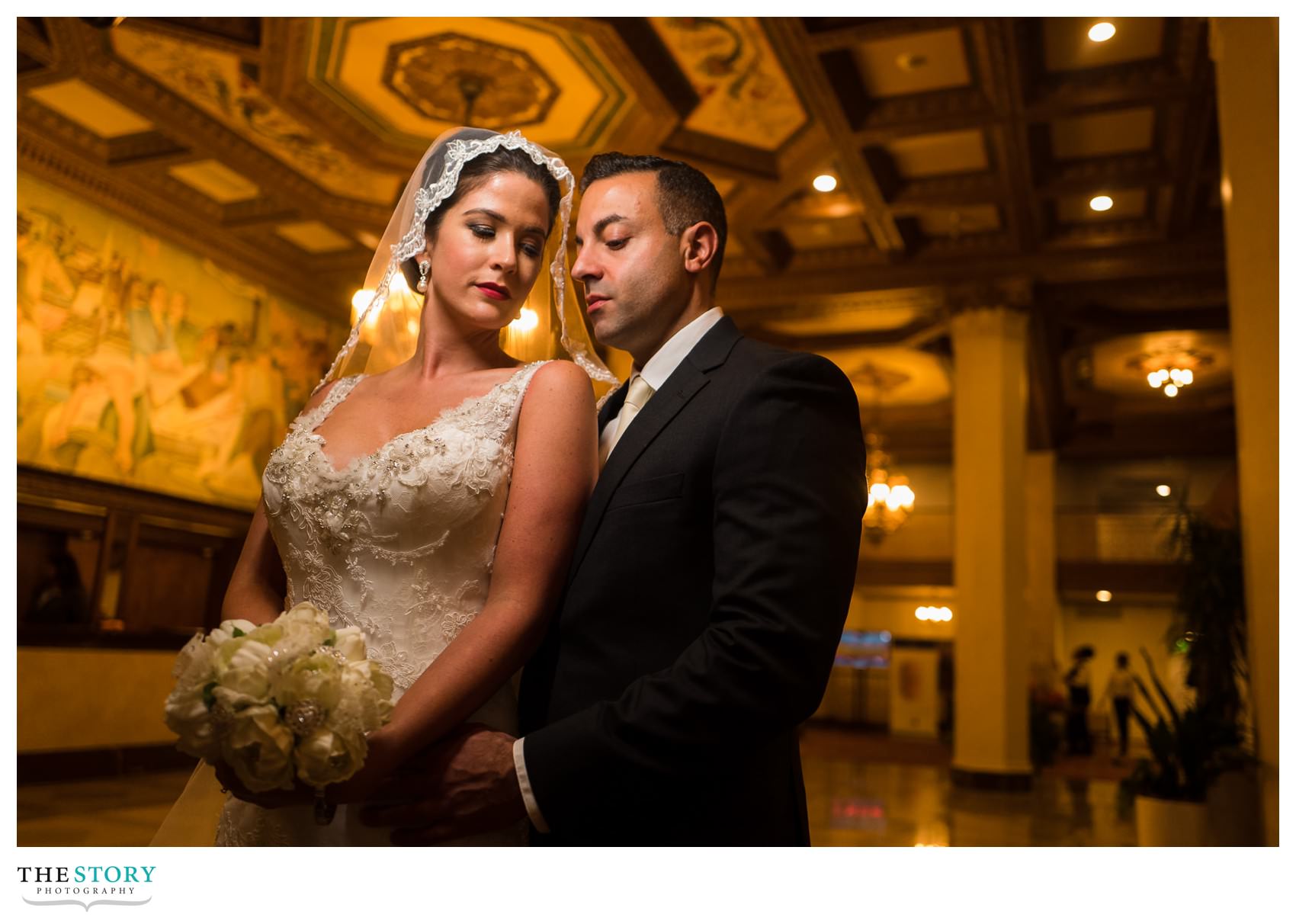 wedding photo in lobby of Hotel Syracuse