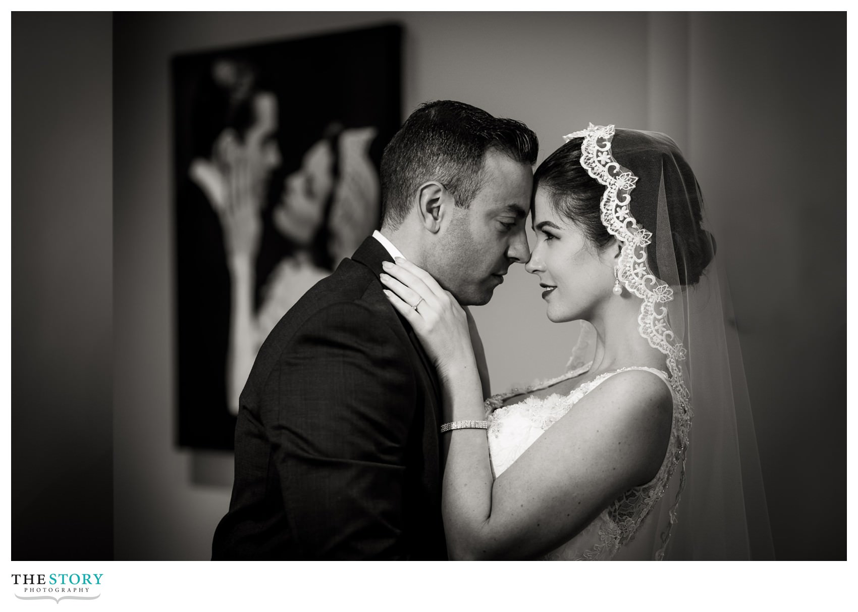 bride and groom portrait in bridal suite at Marriott Syracuse Downtown