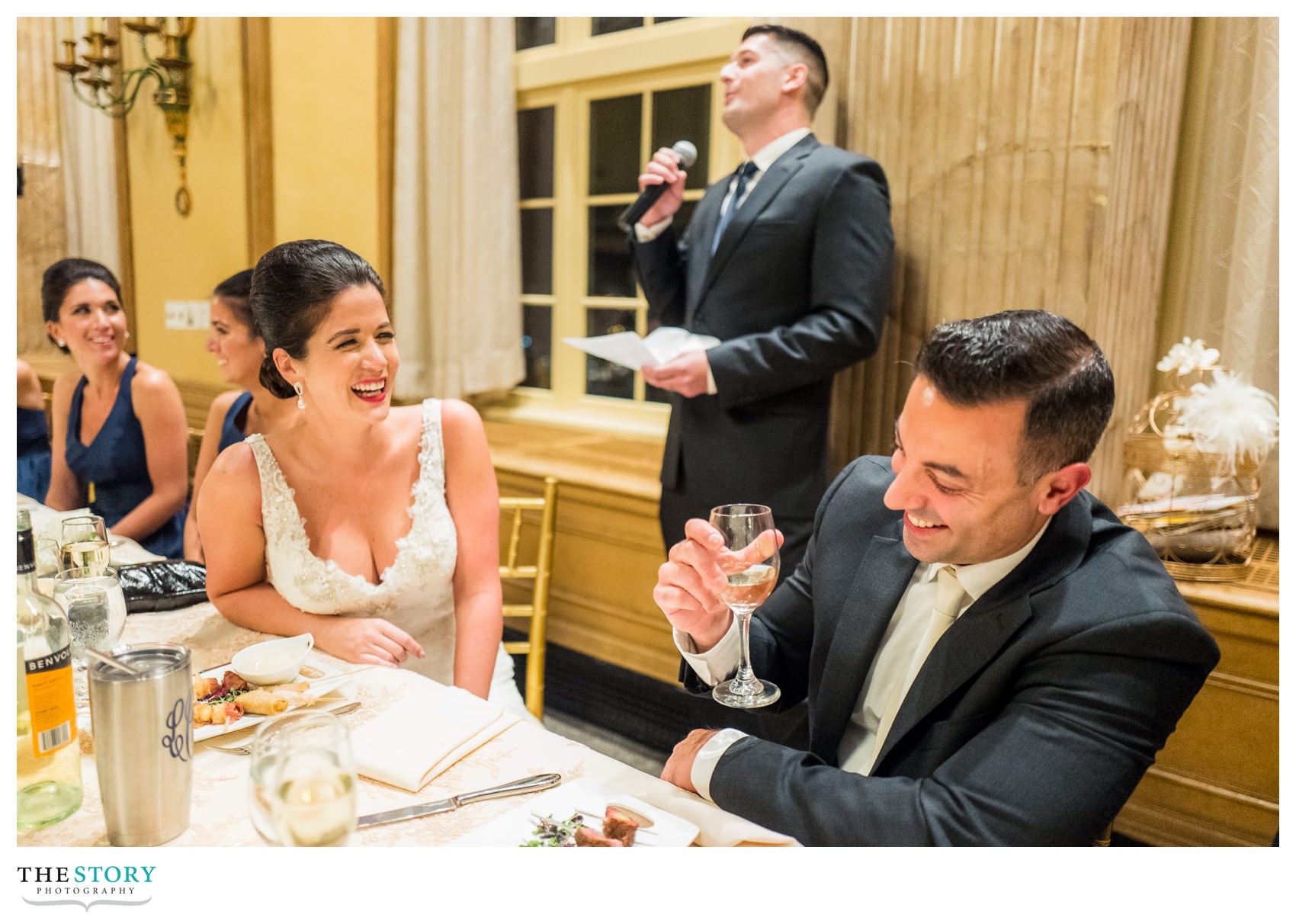 candid reactions to wedding reception toasts at Hotel Syracuse wedding