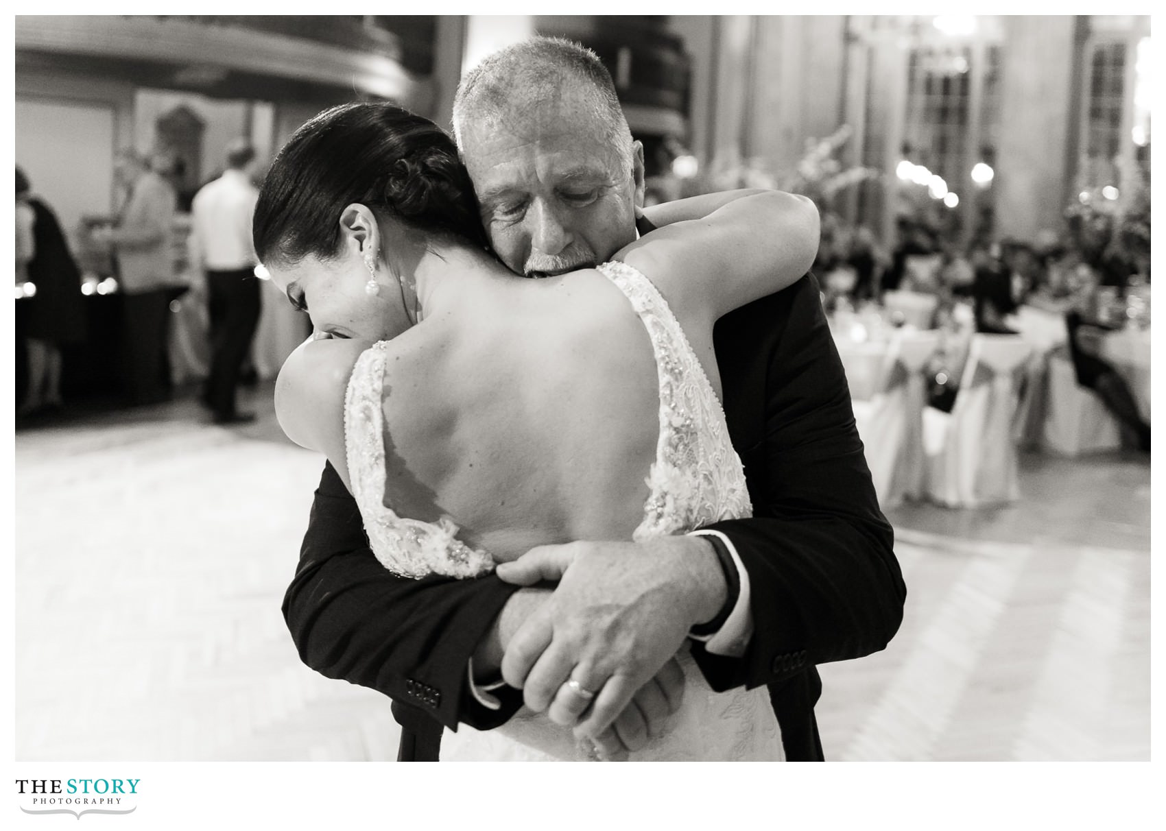 Bride and father dance at wedding reception in ballroom at Marriott Syracuse Downtown