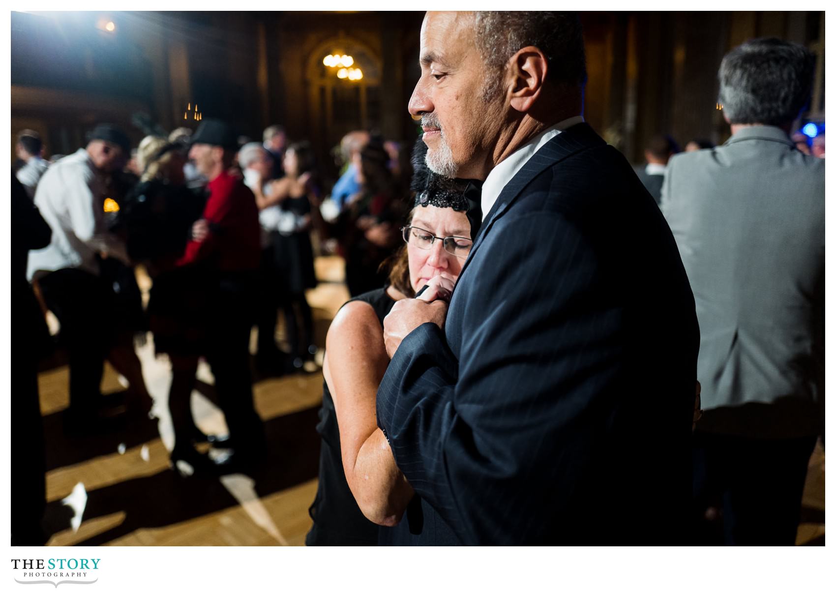 candid moment during Syracuse wedding reception