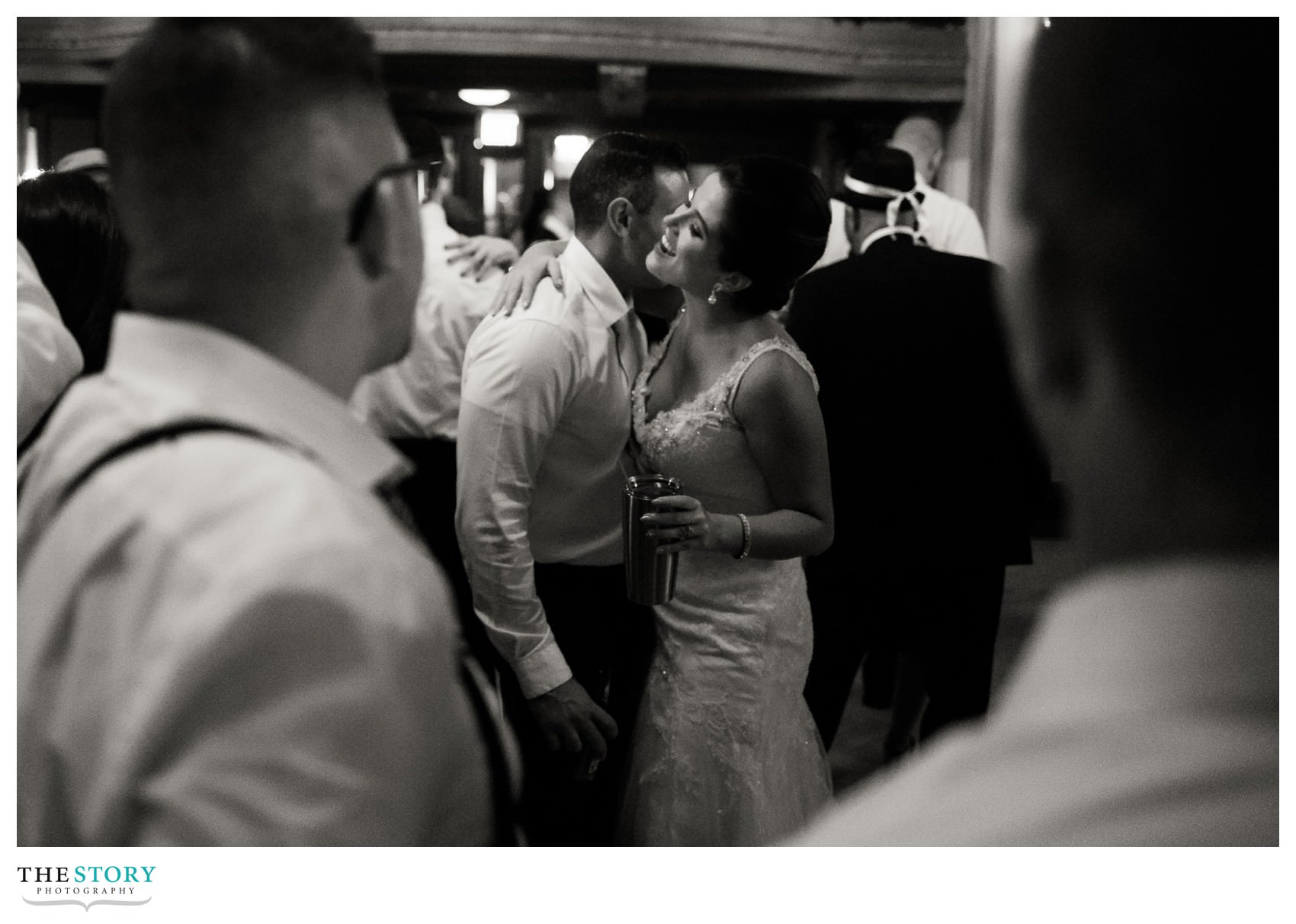 bride and groom enjoy one last moment during the Marriott Syracuse Downtown wedding reception