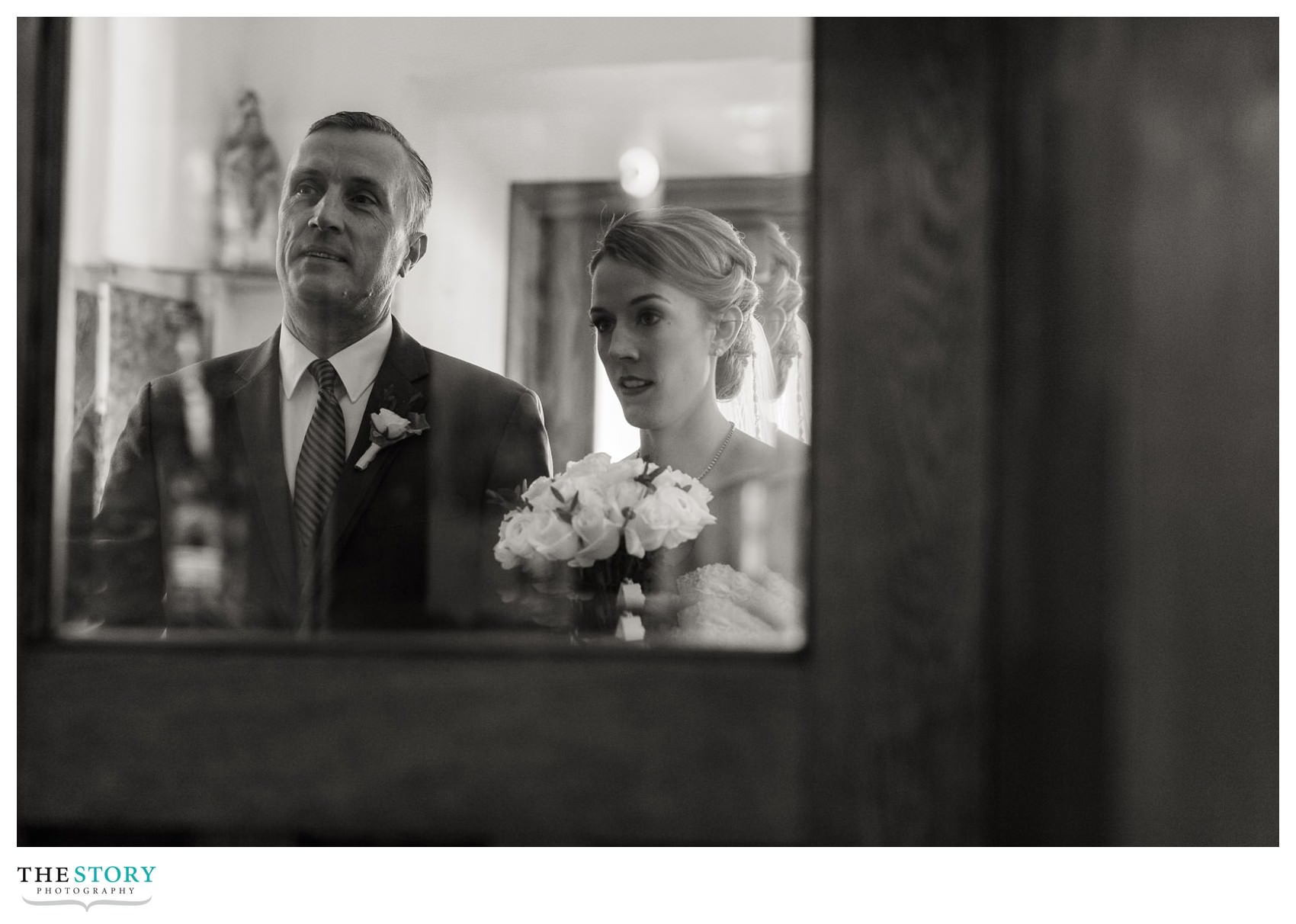 bride and father wait outside of St. Mary's church wedding ceremony