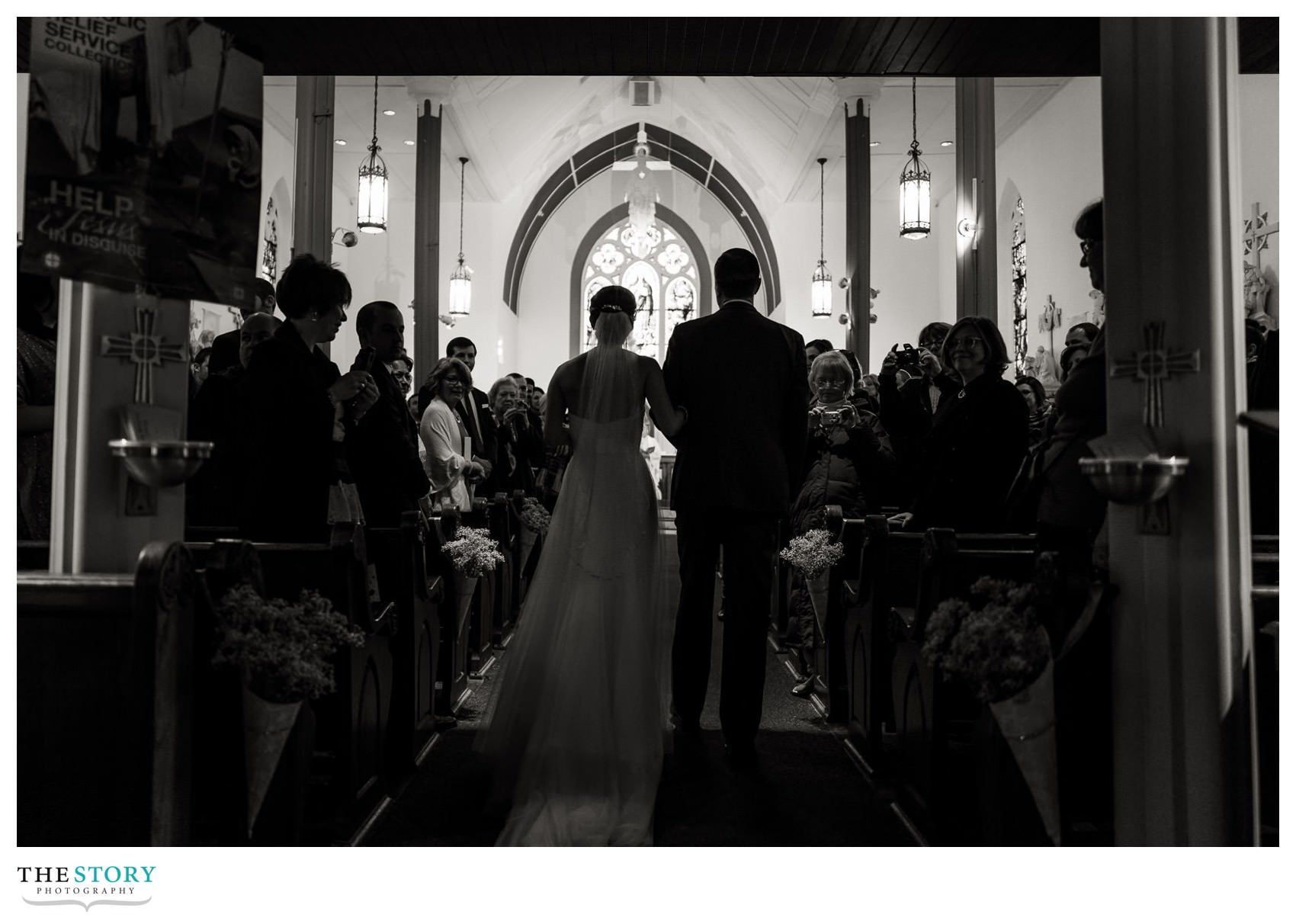 bride walks down the aisle at Cooperstown wedding