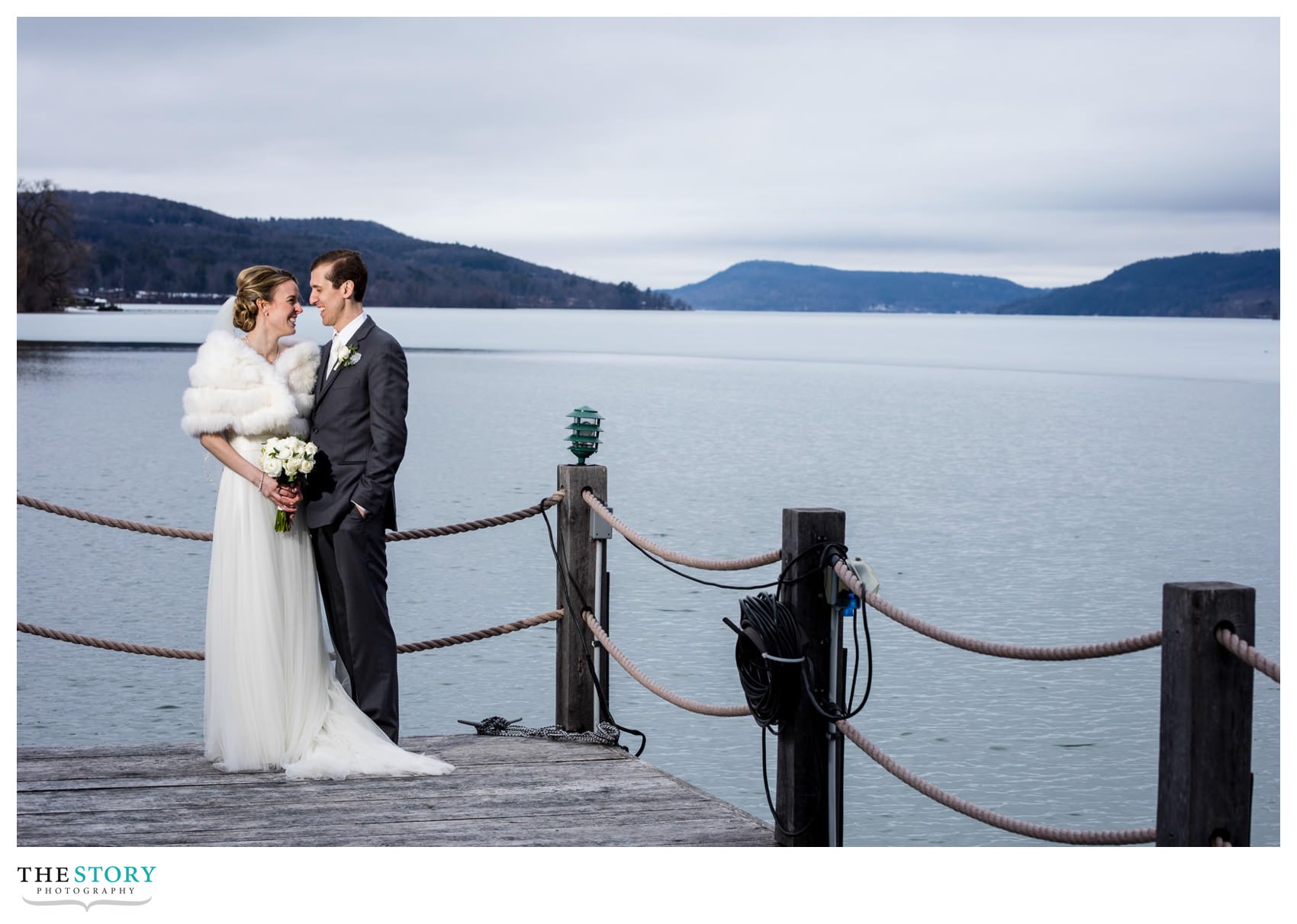 wedding portrait on the dock at Otesaga Resort