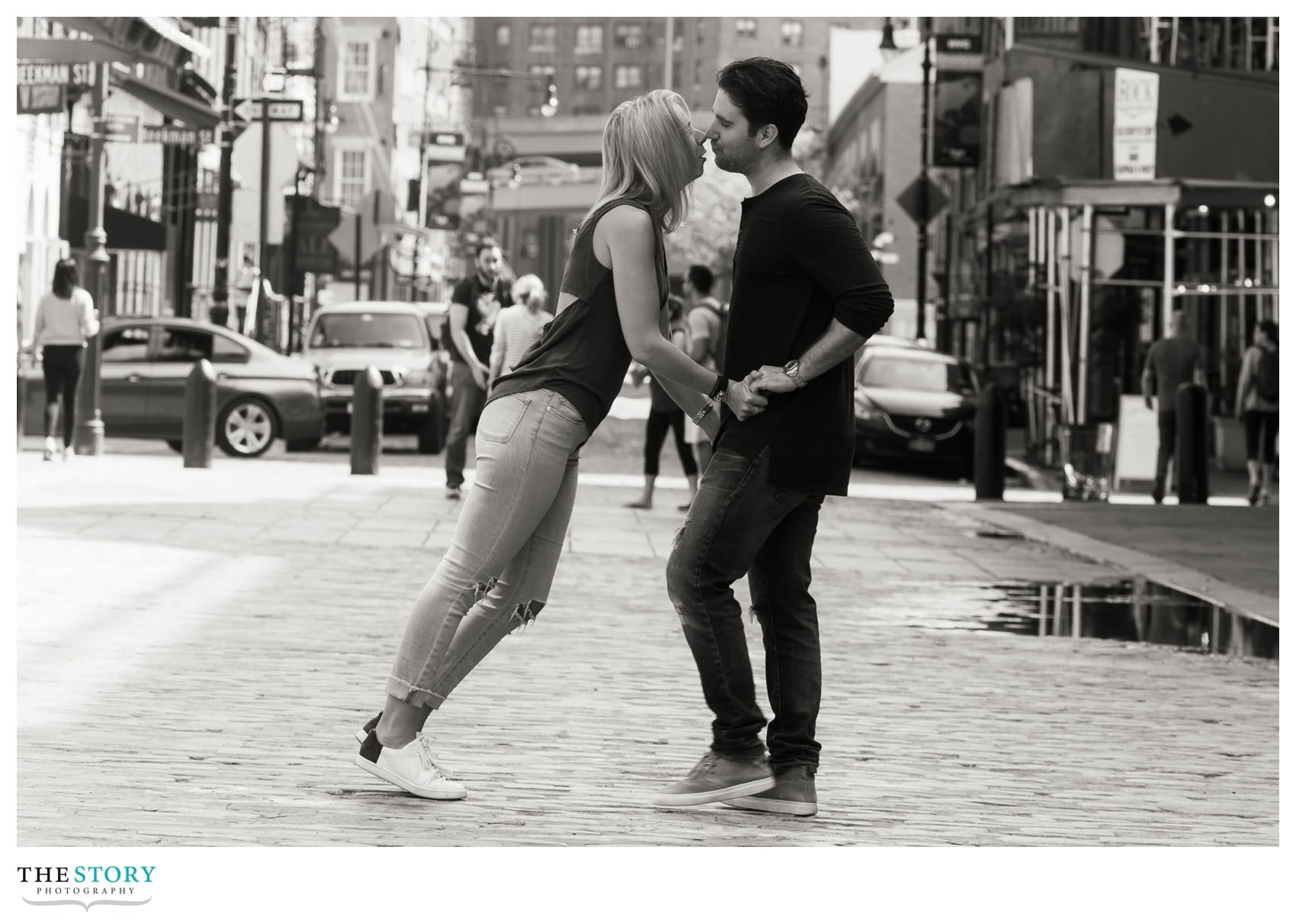 engagement photos on Front Street near South Street Seaport