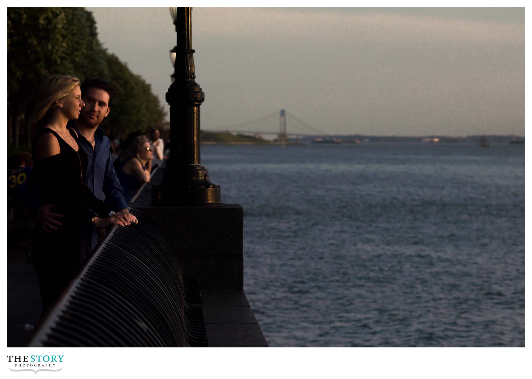 couple watching the sunset over the Hudson River