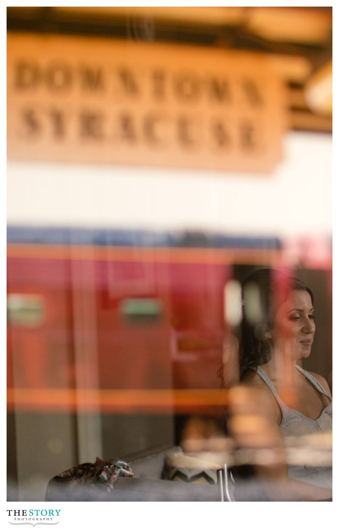 reflection of bride in photograph at Jefferson Clinton Hotel