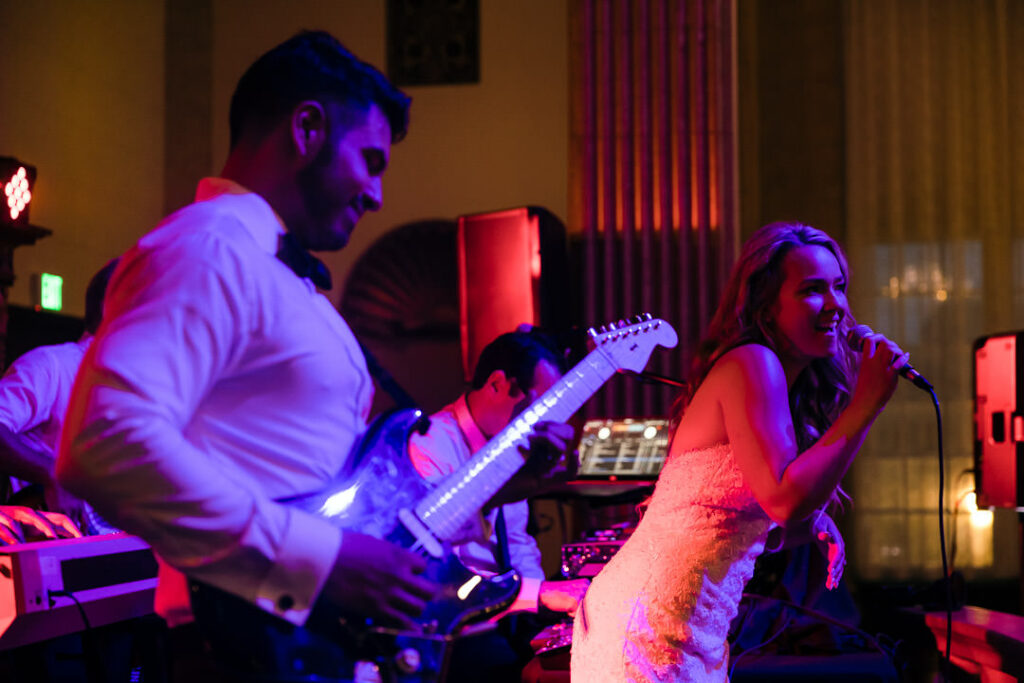 bride singing at her own wedding receptions